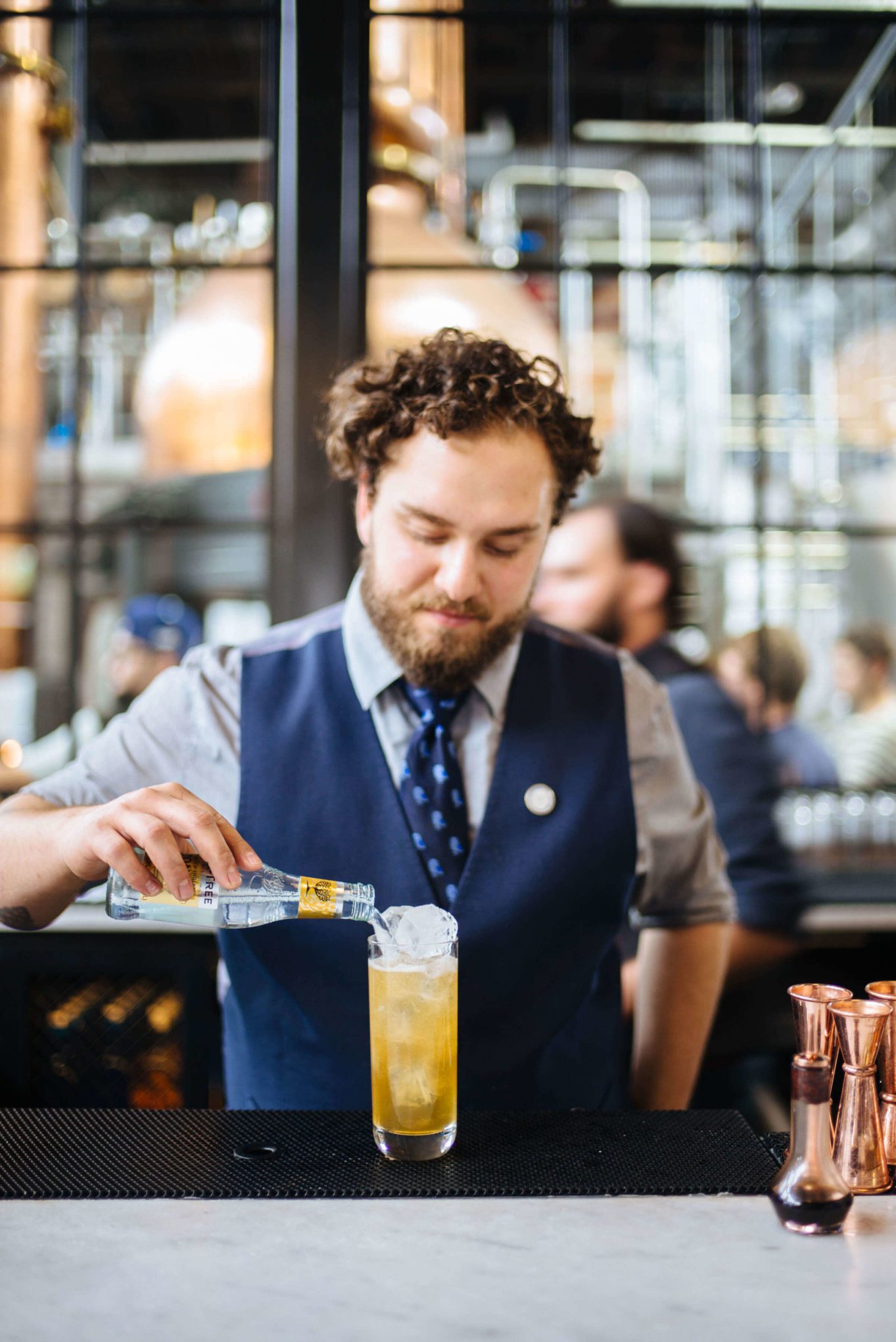 Top your Apple G + T with tonic and an anise star at Philadelphia Distilling, the best fall apple cocktail, The Taste Edit