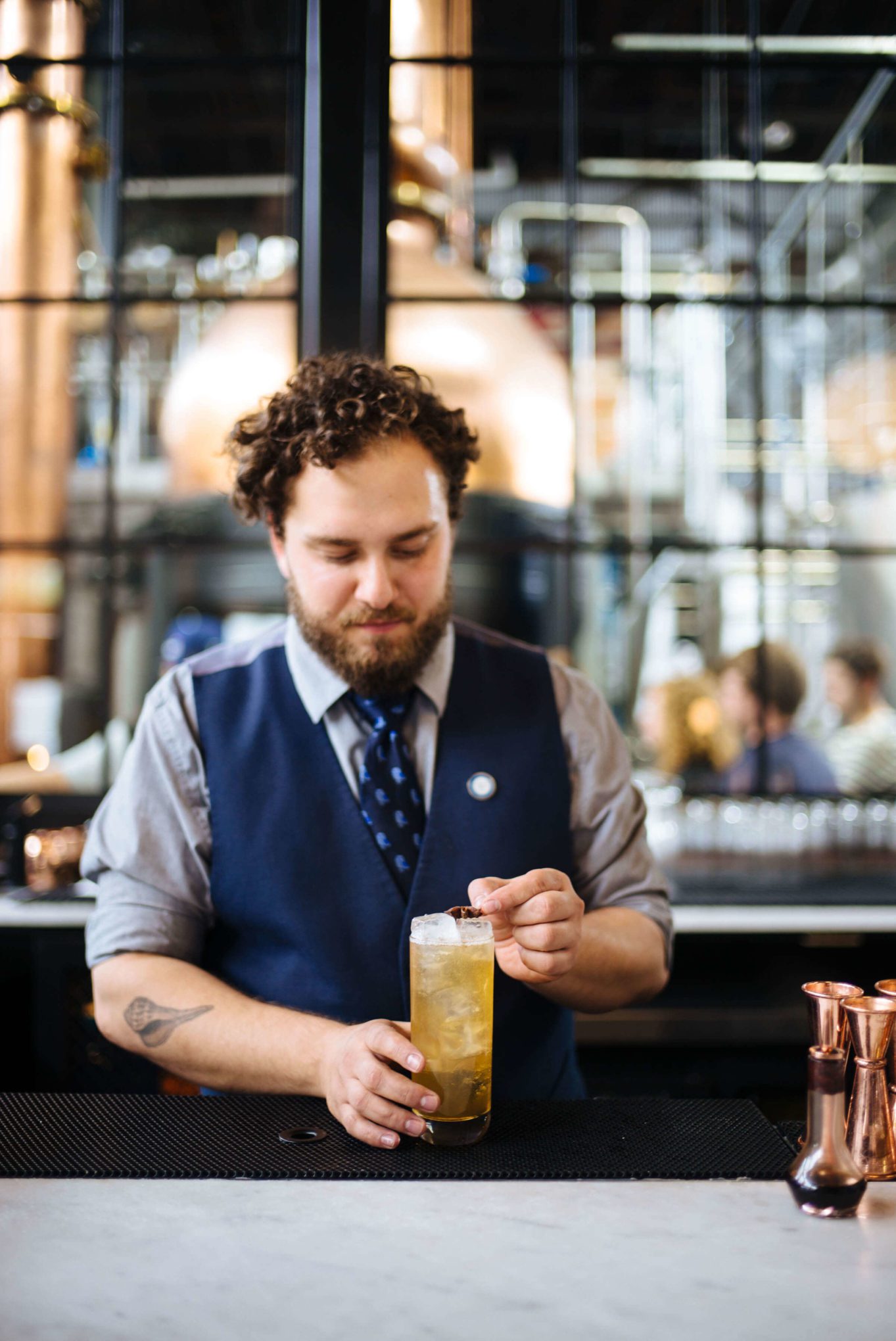 Philadelphia Distilling's bartenderCanyon Shayer makes the Apple Chai G + T Cocktail, the best fall cocktail with apple chai syrup, gin, and garnished with an anise star, get the fall gina and tonic Recipe, The Taste Edit #gin #cocktail