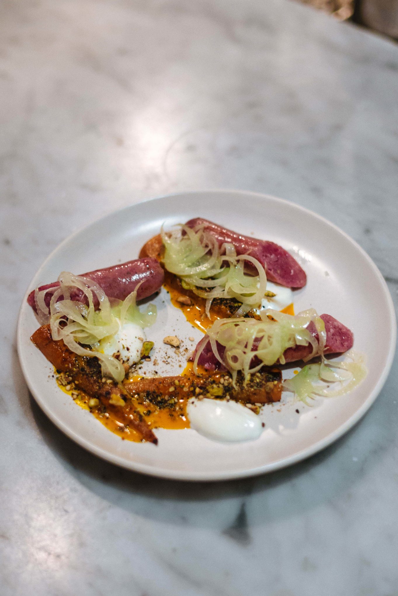 Visit one of the best restaurants in Nashville, Rolf and Daughters, try the lamb sausage with eggplant, yogurt, fennel, and dukkah, see more from TheTasteSF