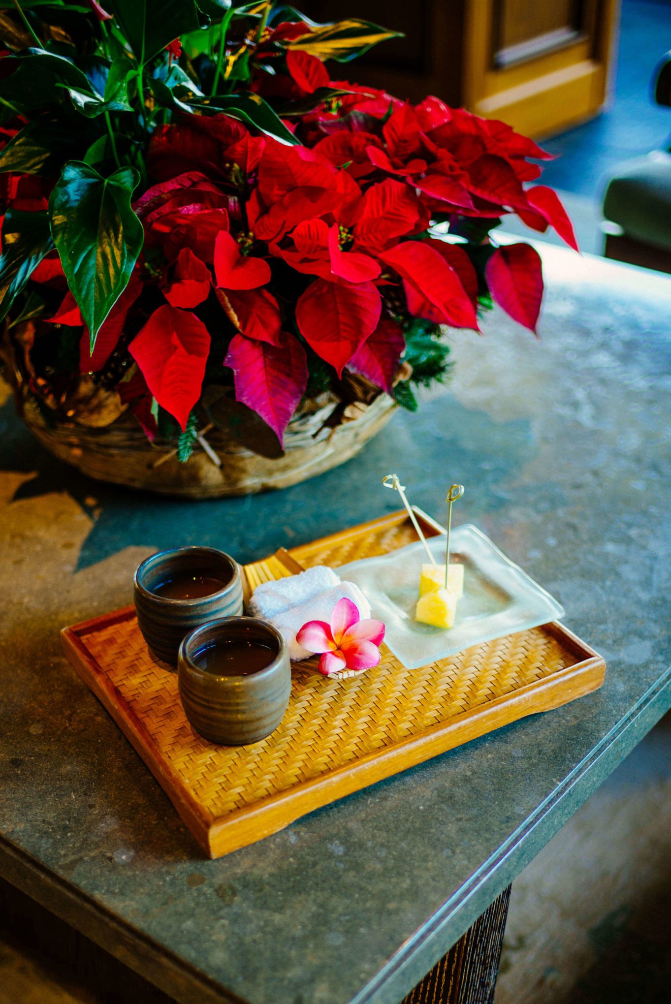 Staying at the Four Seasons Hualalai the luxury hotel in Kona greeted with guava juice and cold towels, thetasteSF