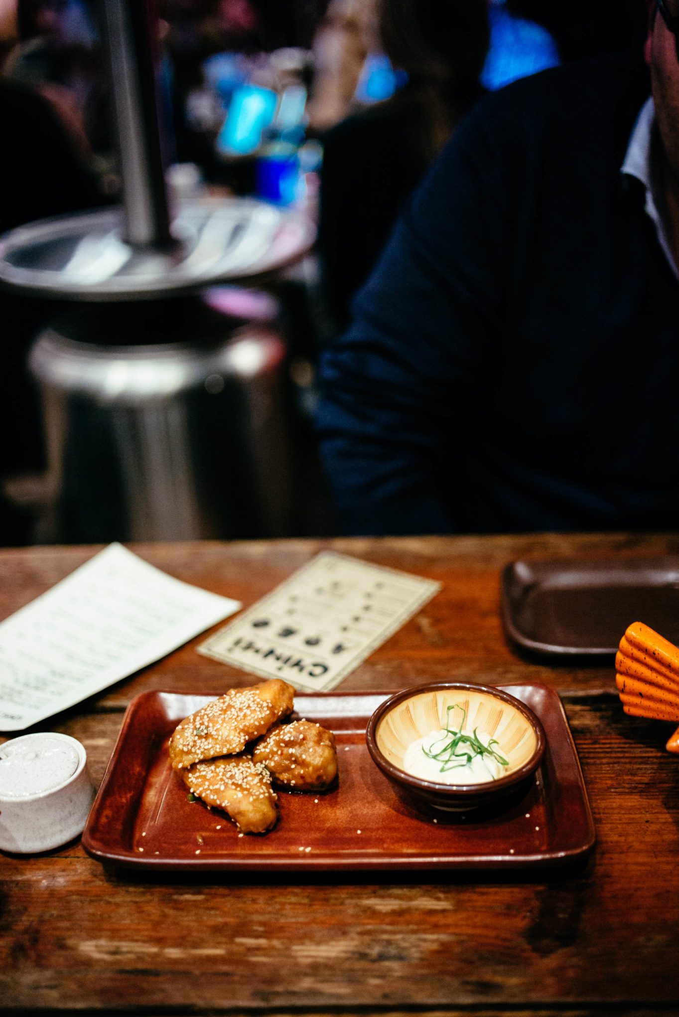 The Taste Edit visiting the best Izakaya in Austin's Miso Wings, lightly fried, miso-garlic glaze, scallion-buttermilk ranch at Kemuri-tatsuya