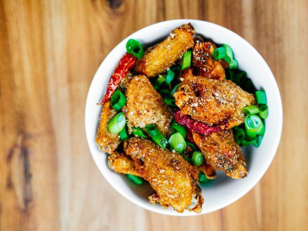 Make Mission Chinese Wing Recipe using szechuan peppercorns for an extra kick! #recipe #chicken #wings #appetizers