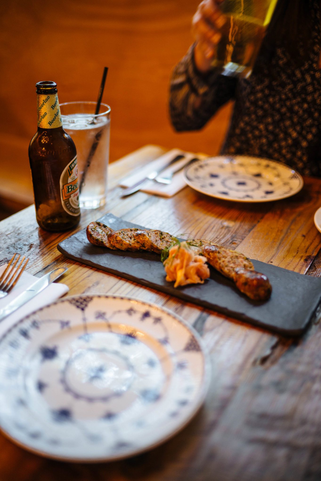 Try Luang Prabang Lemongrass sausage with pork sausage with fresh herbs, jasmine rice, ground pork belly, and pickled ginger was both rich and refreshing at Bida Manda Laotian Bar and Restaurant in Raleigh NC thetasteedit