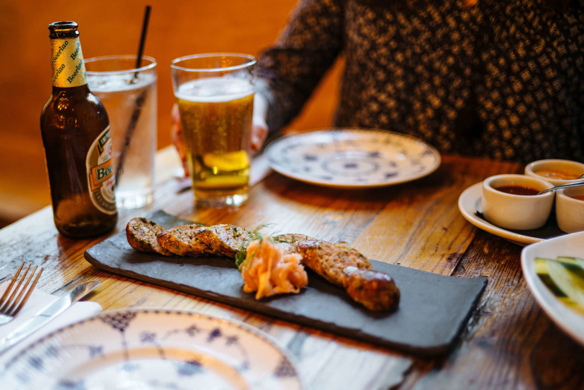 Try the Luang Prabang Lemongrass sausage with pork sausage with fresh herbs, jasmine rice, ground pork belly, and pickled ginger was both rich and refreshing at Bida Manda Laotian Bar and Restaurant in Raleigh NC thetasteedit