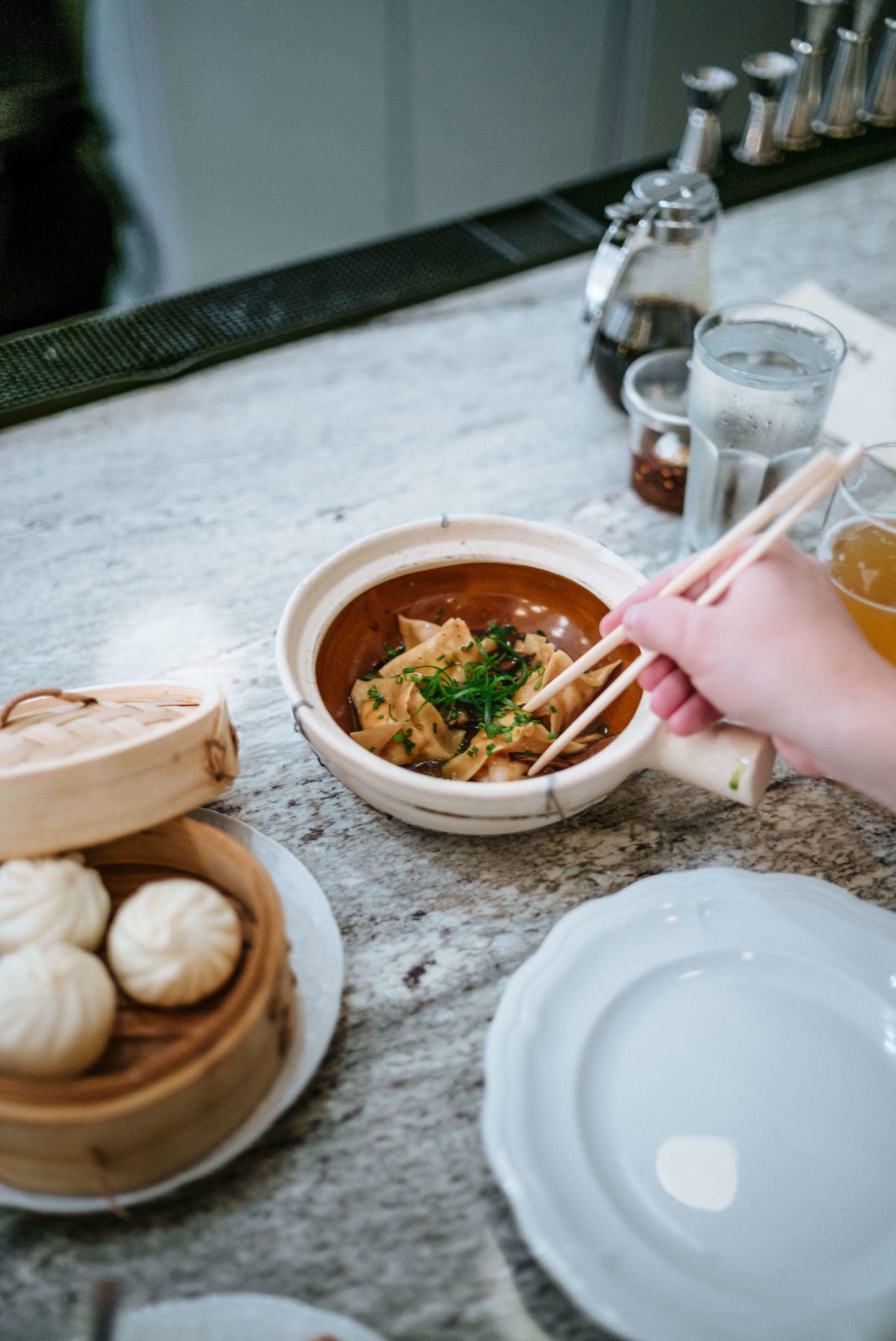 Order dim sum, especially the sEAFOOD DUMPLING four lobster, shrimp, scallop, and cabbage dumplings served in garlic and black mushroom sauce at Brewery Bhavana in Raleigh, The Taste Edit