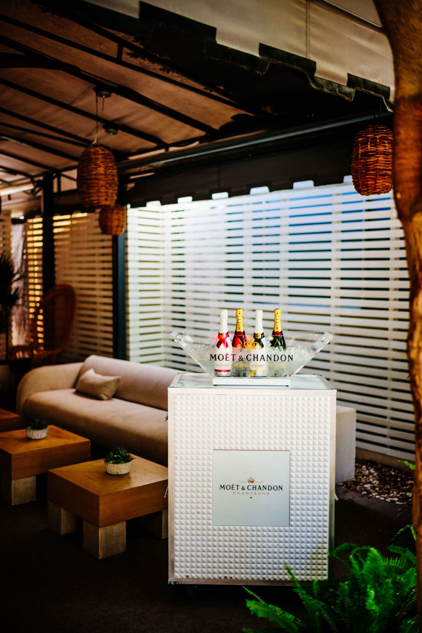 Check out the outdoor patio with the moet chandon cart at Chi Chi at the Avalon Hotel Palm Springs , The Taste Edit