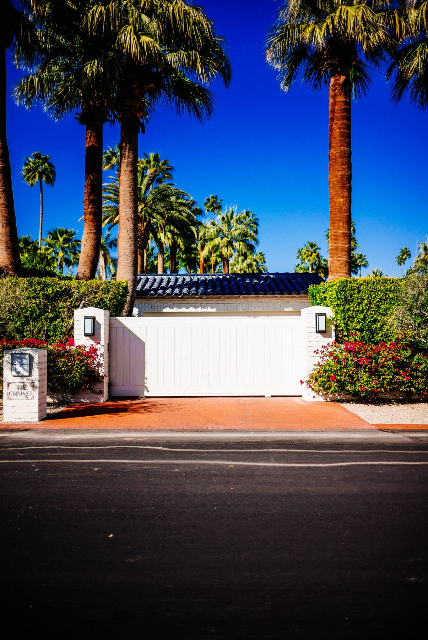 We love the blue tile roof on this home : Tour the beautiful Mid Century Homes in Palm Springs, The Taste Edit