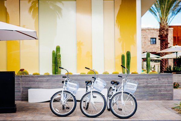 Take a bicycle to tour Palm Springs homes when you stay at the Kimpton Rowan Hotel in Palm Springs is a dessert retreat, The Taste Edit