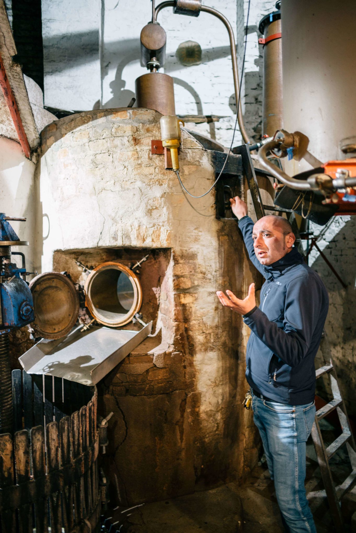Romano's apprentice and now grappa maker, Fabrizio Sobrero, explains how the fire burning still works. The Taste Edit visiting Romano Levi Grappa distillery in Piedmont, Italy.