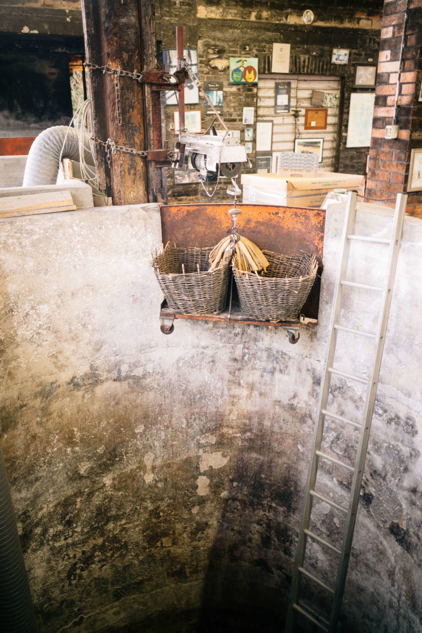 Storage for the pumice to make the grappa. The Taste Edit visiting Romano Levi Grappa distillery in Piedmont, Italy.