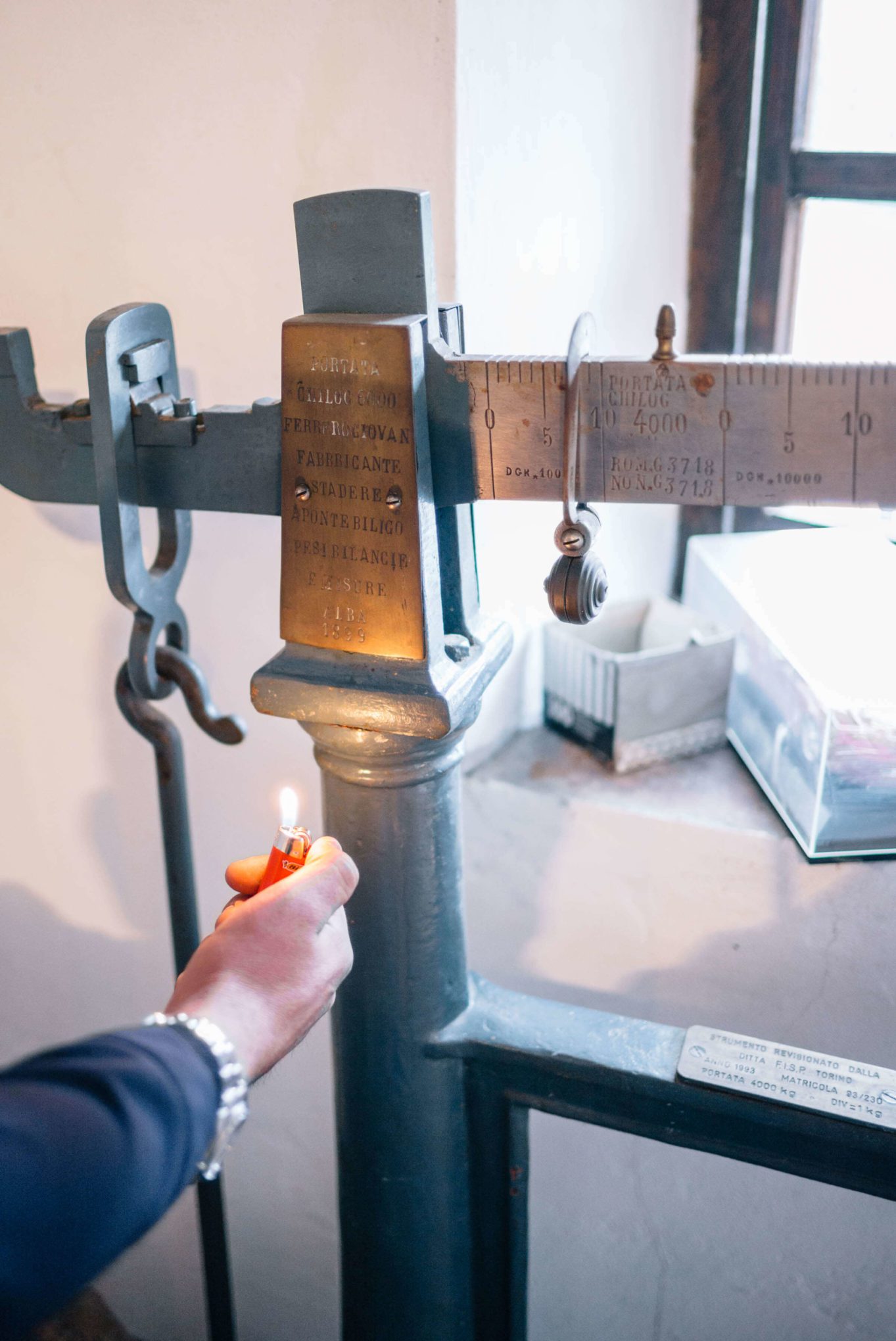 The scale used to weigh the pumice to make grappa. The Taste Edit visiting Romano Levi Grappa distillery in Piedmont, Italy.