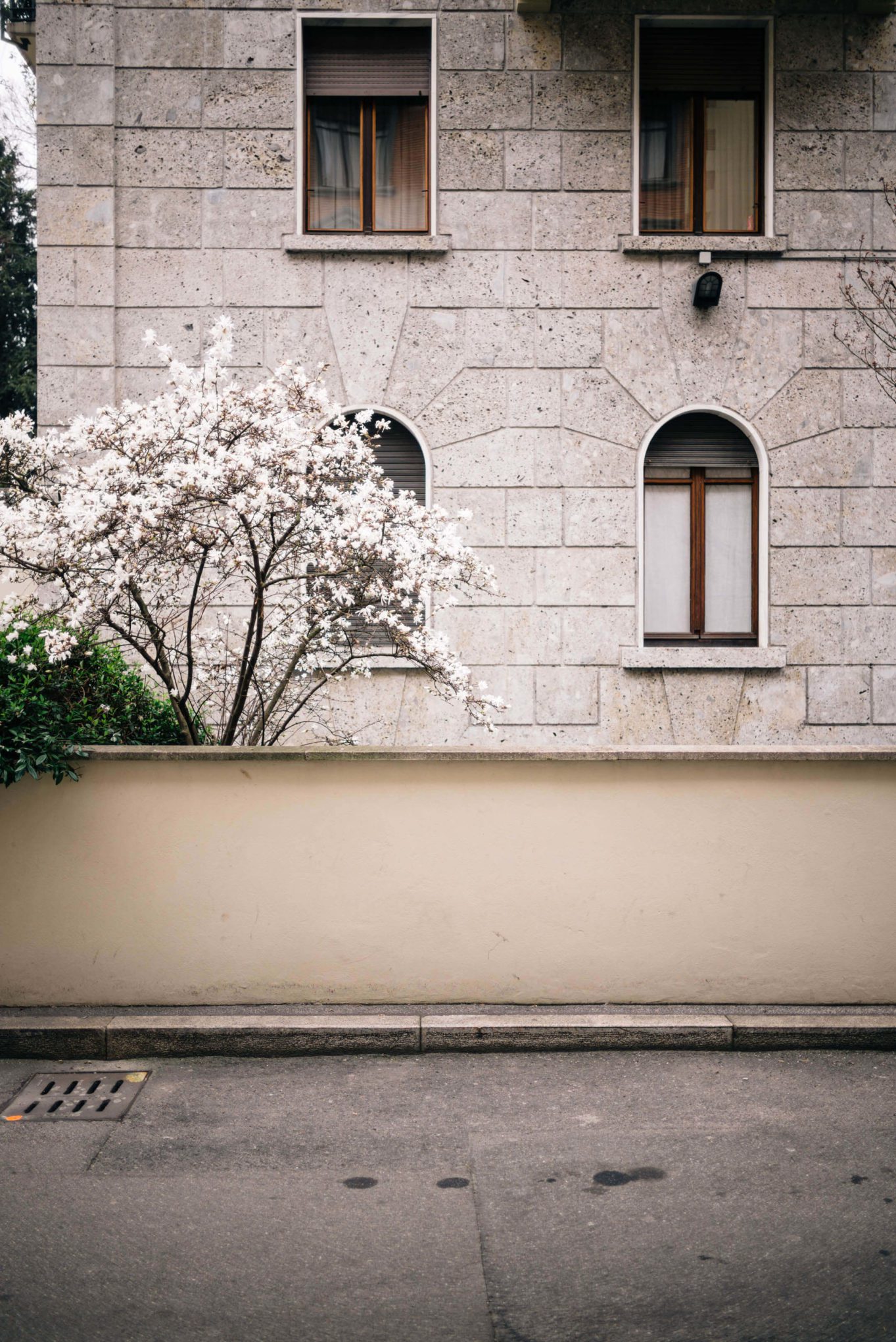 The neighborhood where the luxury Hotel Bulgari Milano is located is full of blooming trees in the spring, The Taste Edit