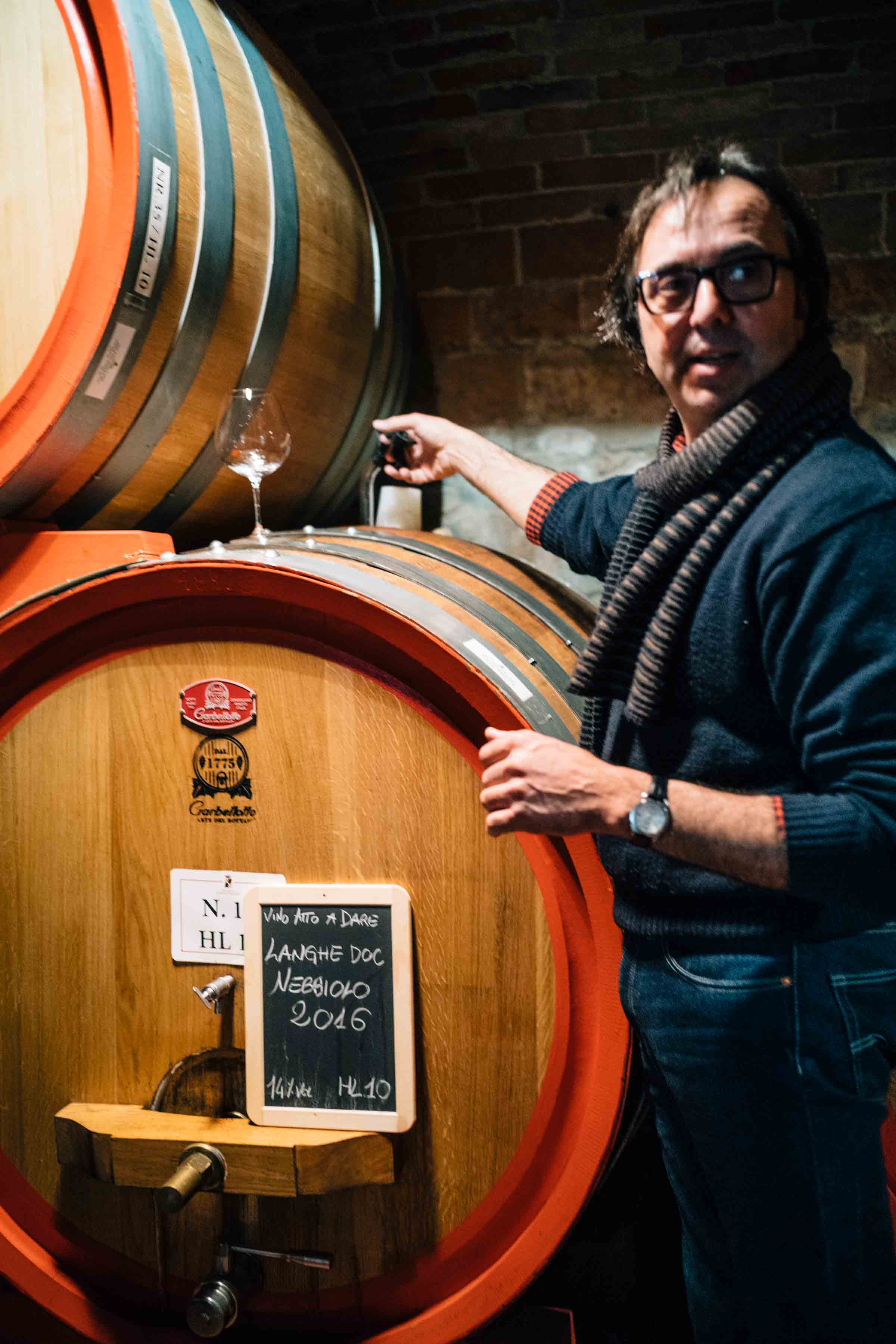 Taste Barolo wine in Piedmont. Winemaker Mario Fontana gives us a barrel tasting of his traditional and natural wine in Piedmont Italy