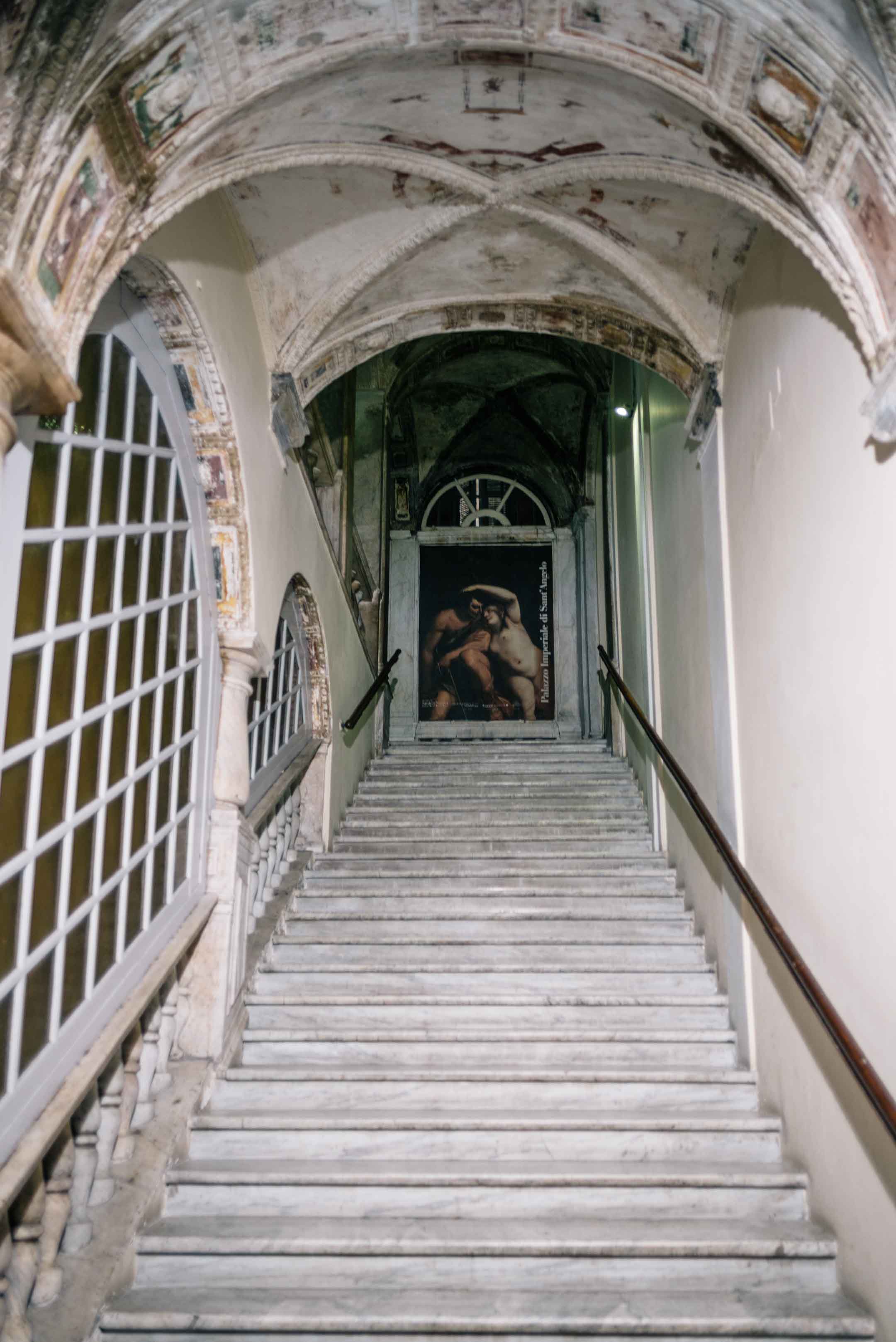 An amazing staircase that leads to Les Rouges cocktail bar in Genova, Italy that's housed in a 16th century palace.