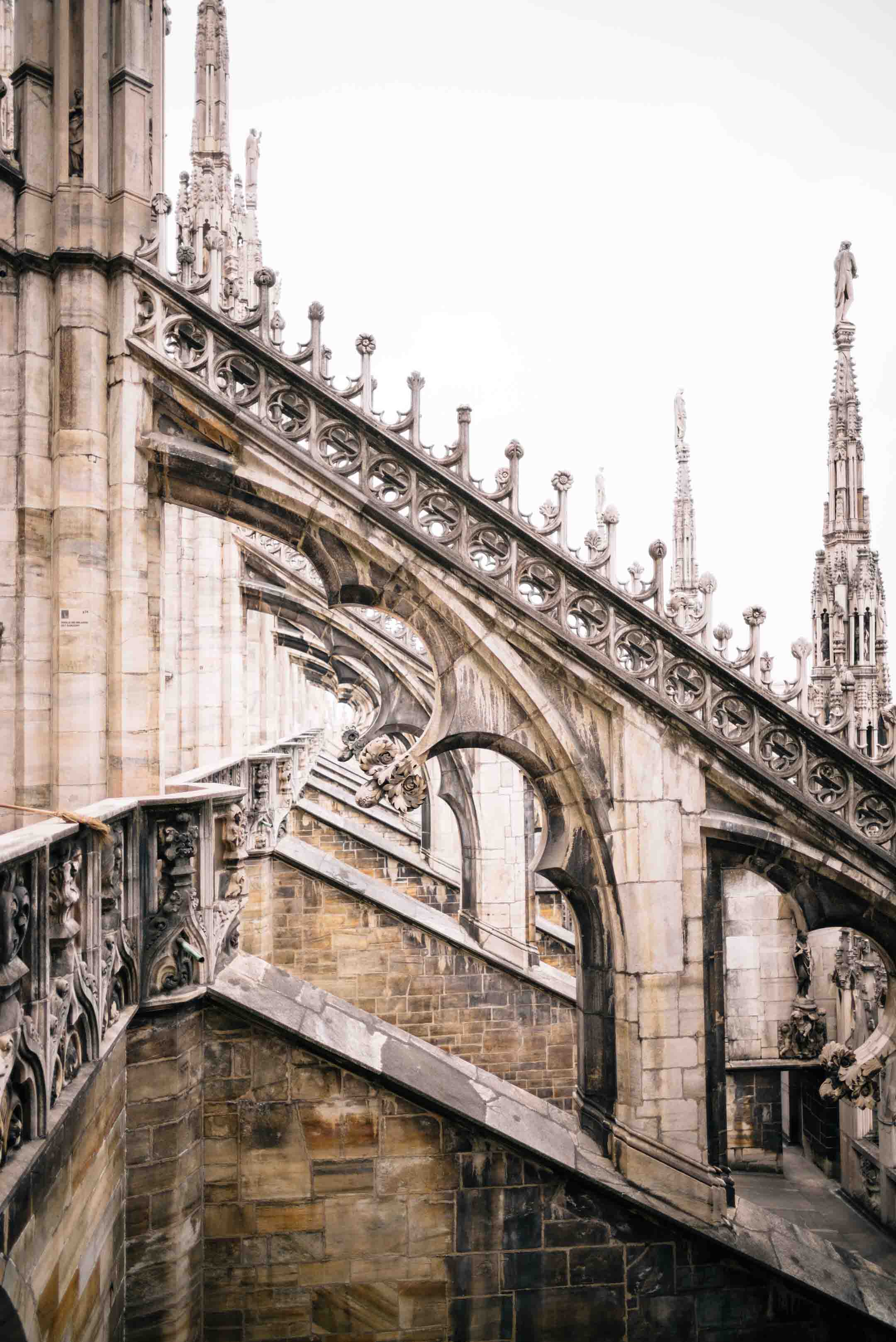 Get insider tips on your visit the milan cathedral duomo di milano, climb to the roof and see the beautiful architecture and the entire city of milan, The Taste Edit