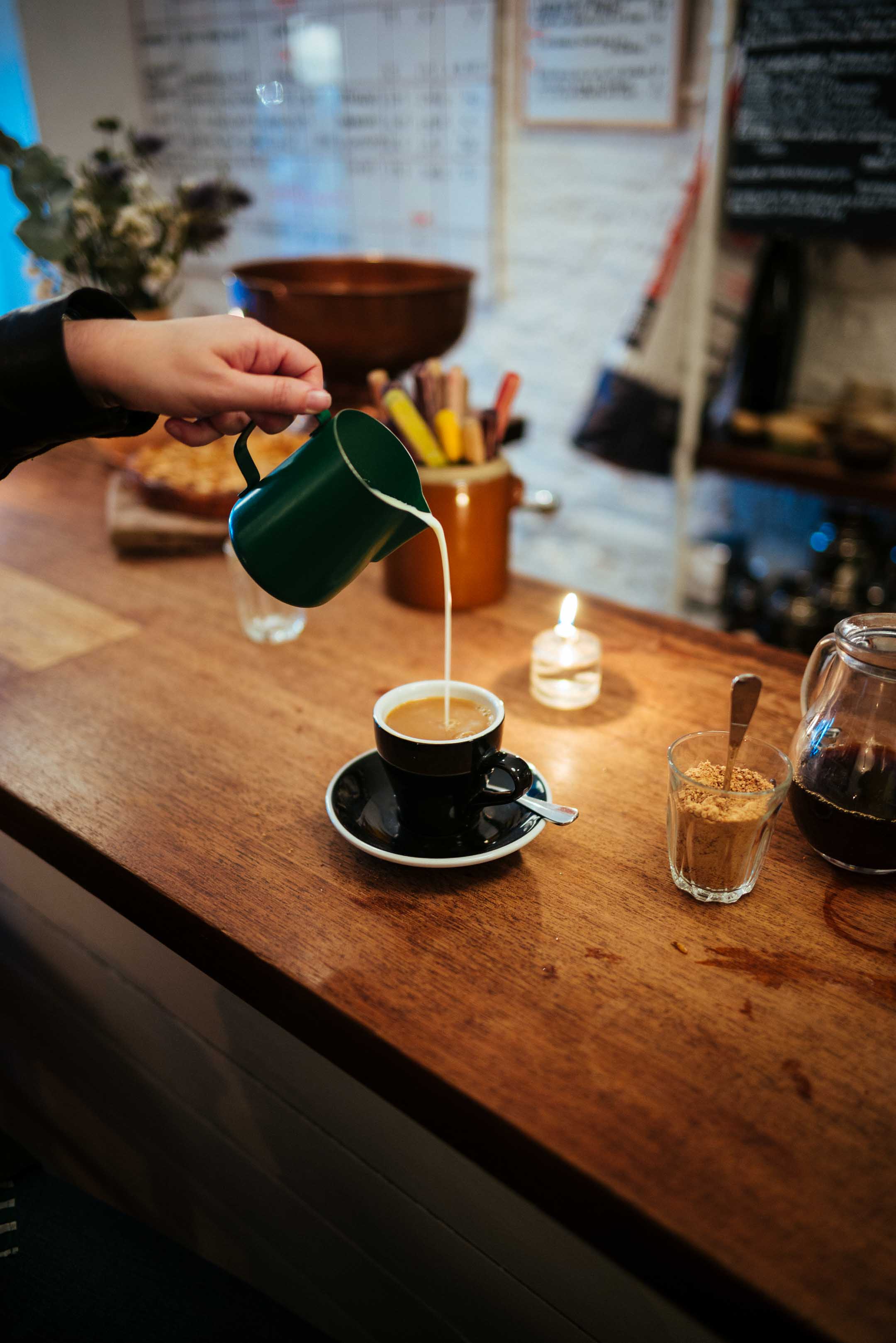 Cozy up at Ducksoup in London. The Taste Edit recommends ordering a slice of tart and coffee on a rainy day in Soho.