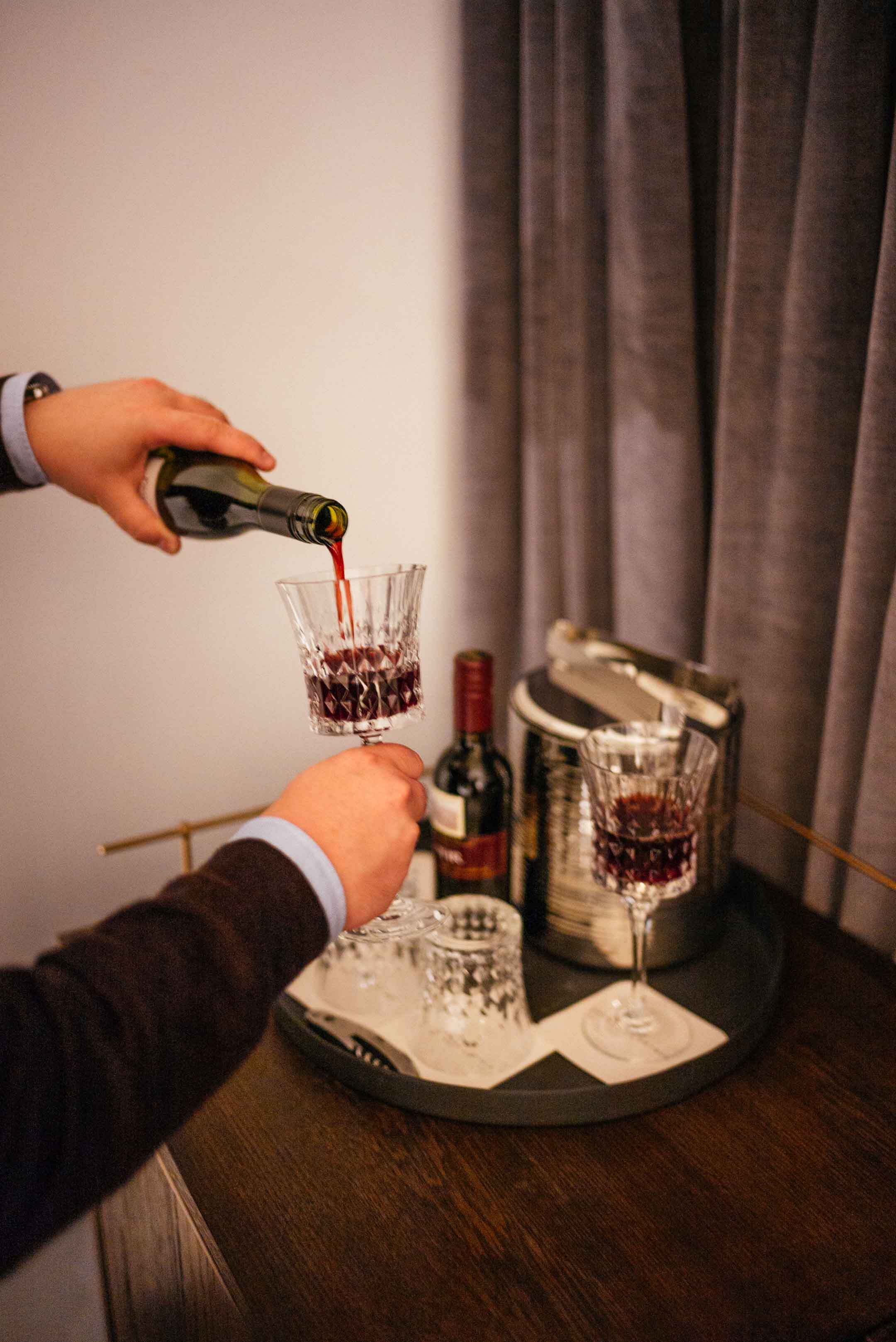 The Taste Edit pouring wine in the Thompson Nashville hotel located in the gulch neighborhood in downtown Nashville.