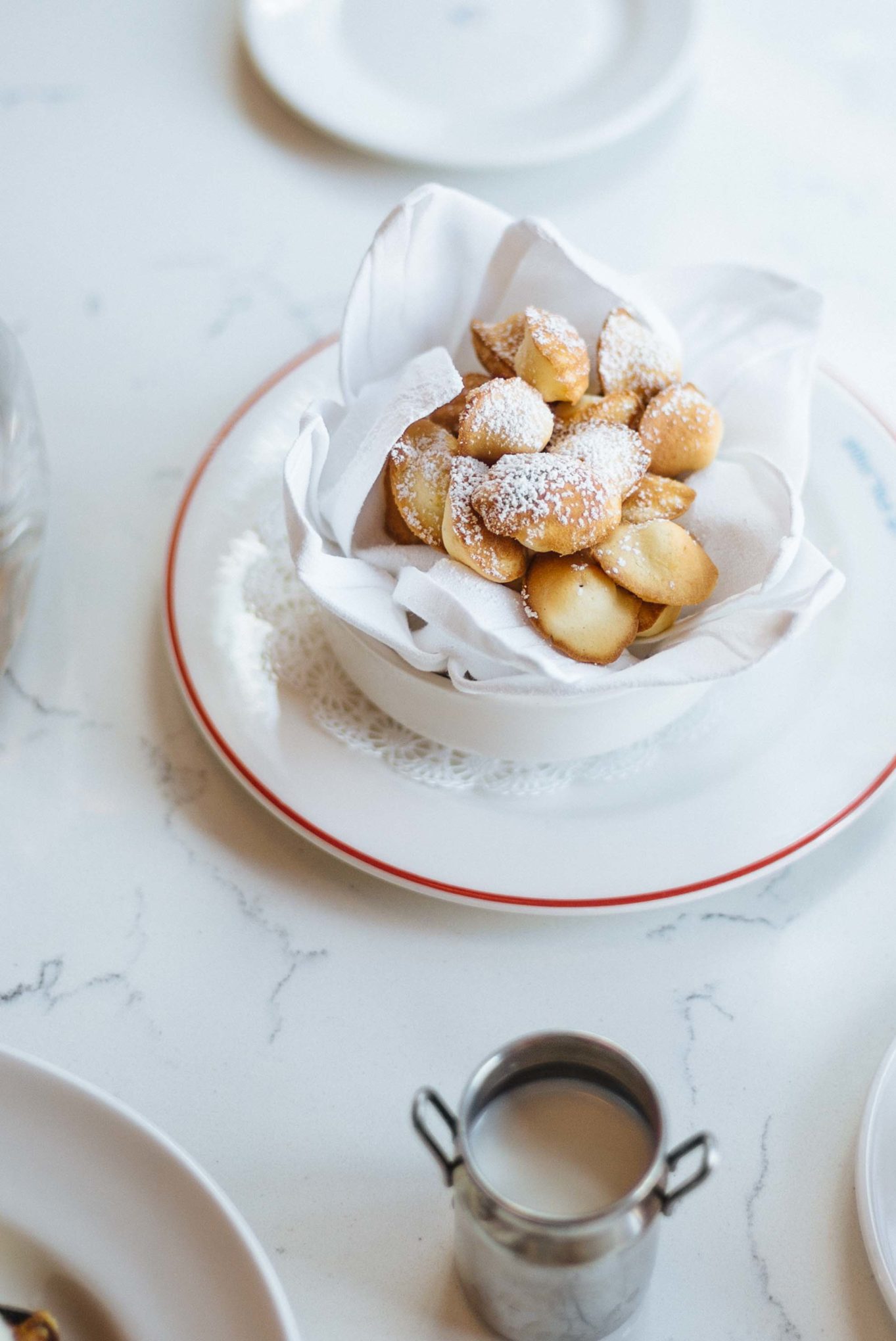 Lunch at Le Politique restaurant in Austin serving Mini Madeleines