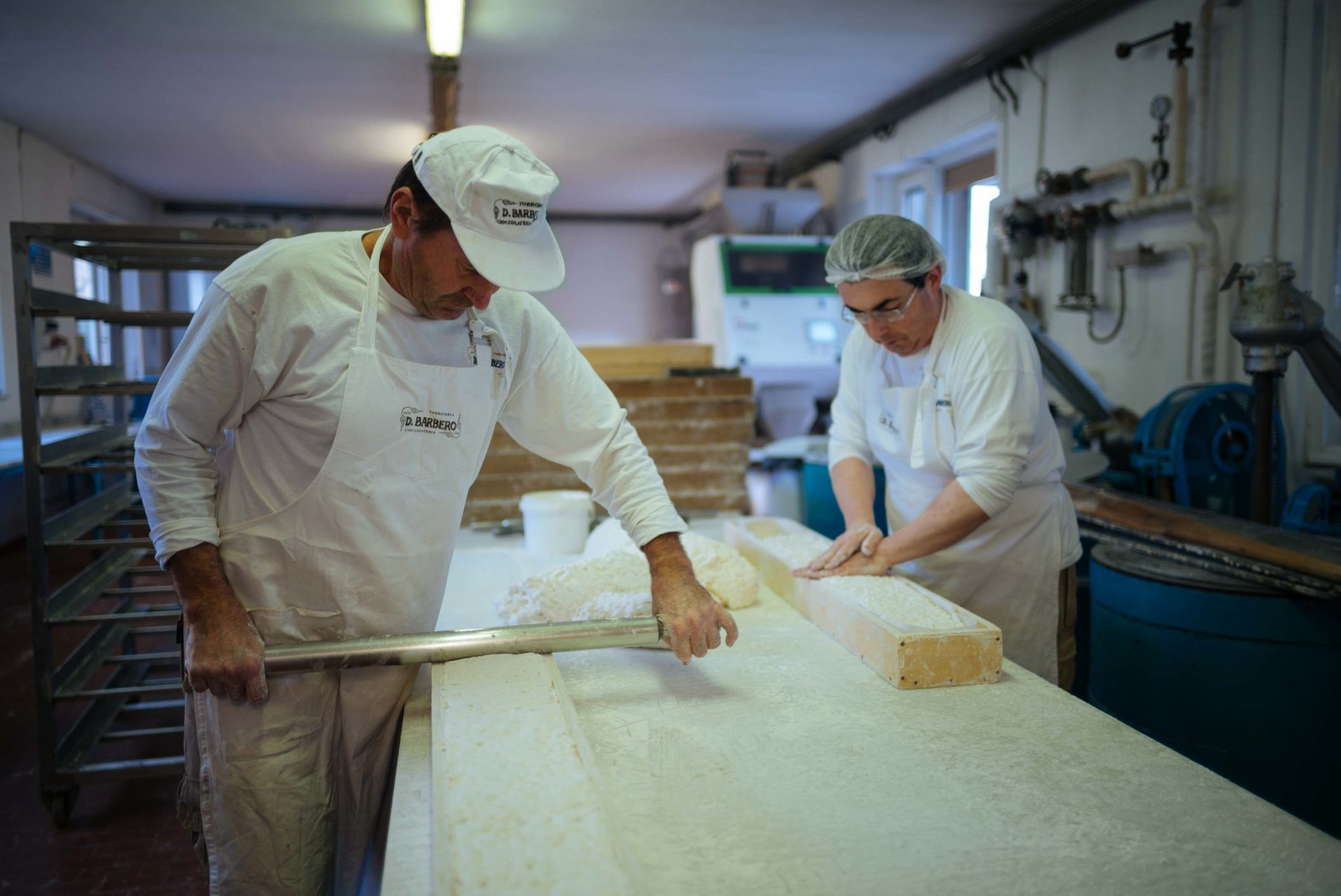 Tour a behind the scenes look at D. Barbero torrone and chocolate factory in Asti, piedmont - making torrone by hand in the traditional way since 1883