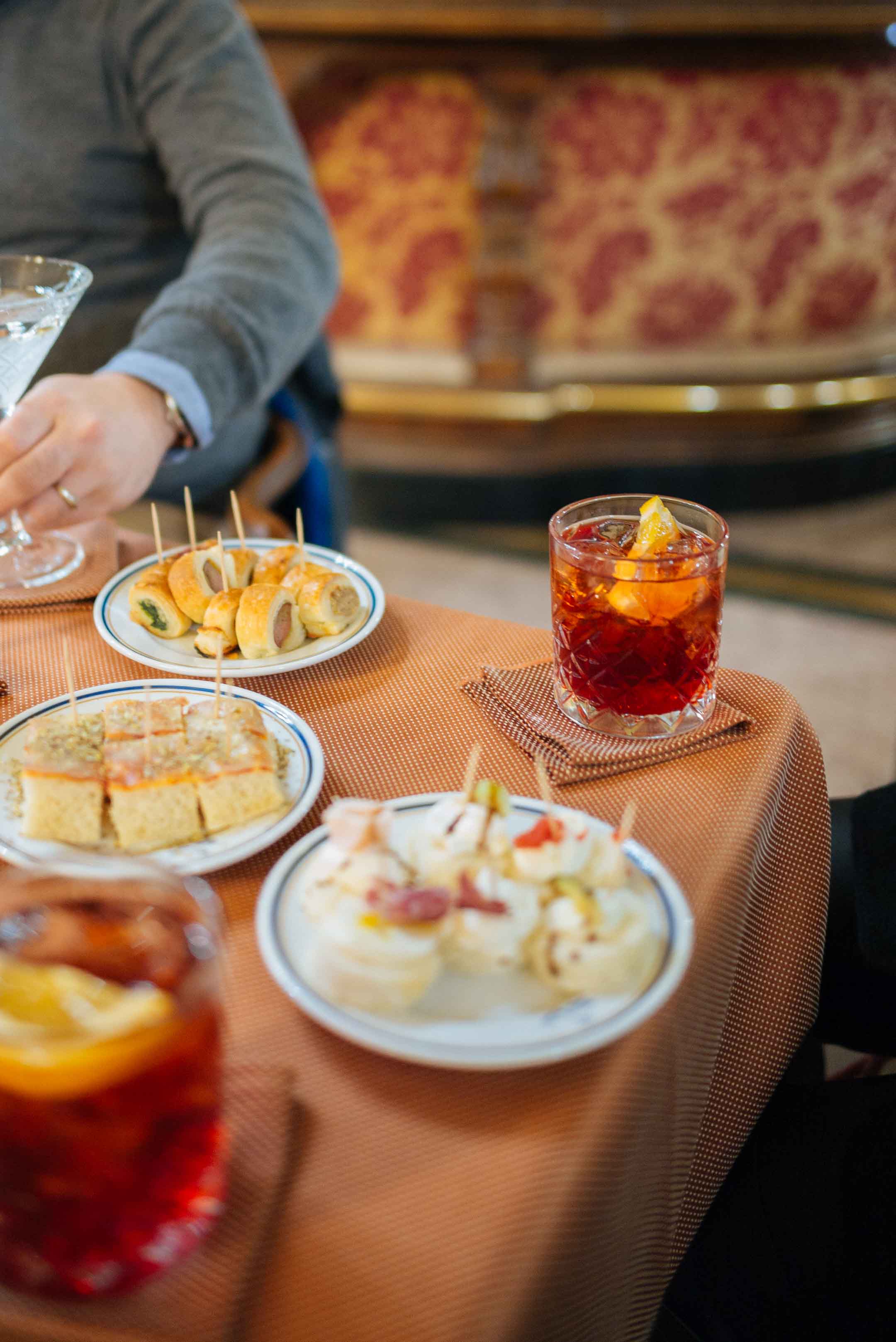 Order a negroni in cafe torino or try the sweets