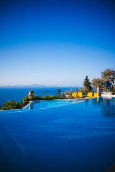 Relax by a double infinity pool at Hotel Caesar Augustus Capri Italy on your Amalfi Coast vacation, The Taste Edit