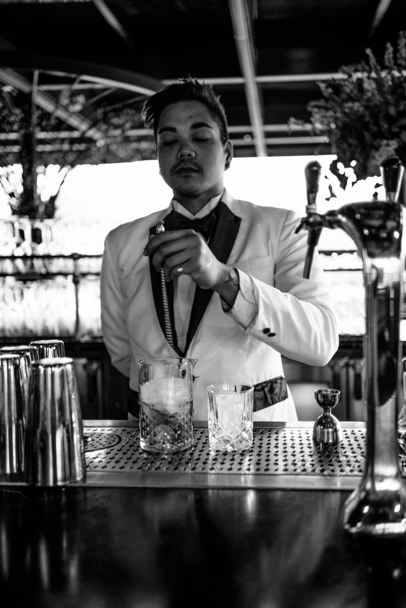 Mixing cocktails on the rooftop bar at the over-the-top steakhouse Born and Raised in San Diego 