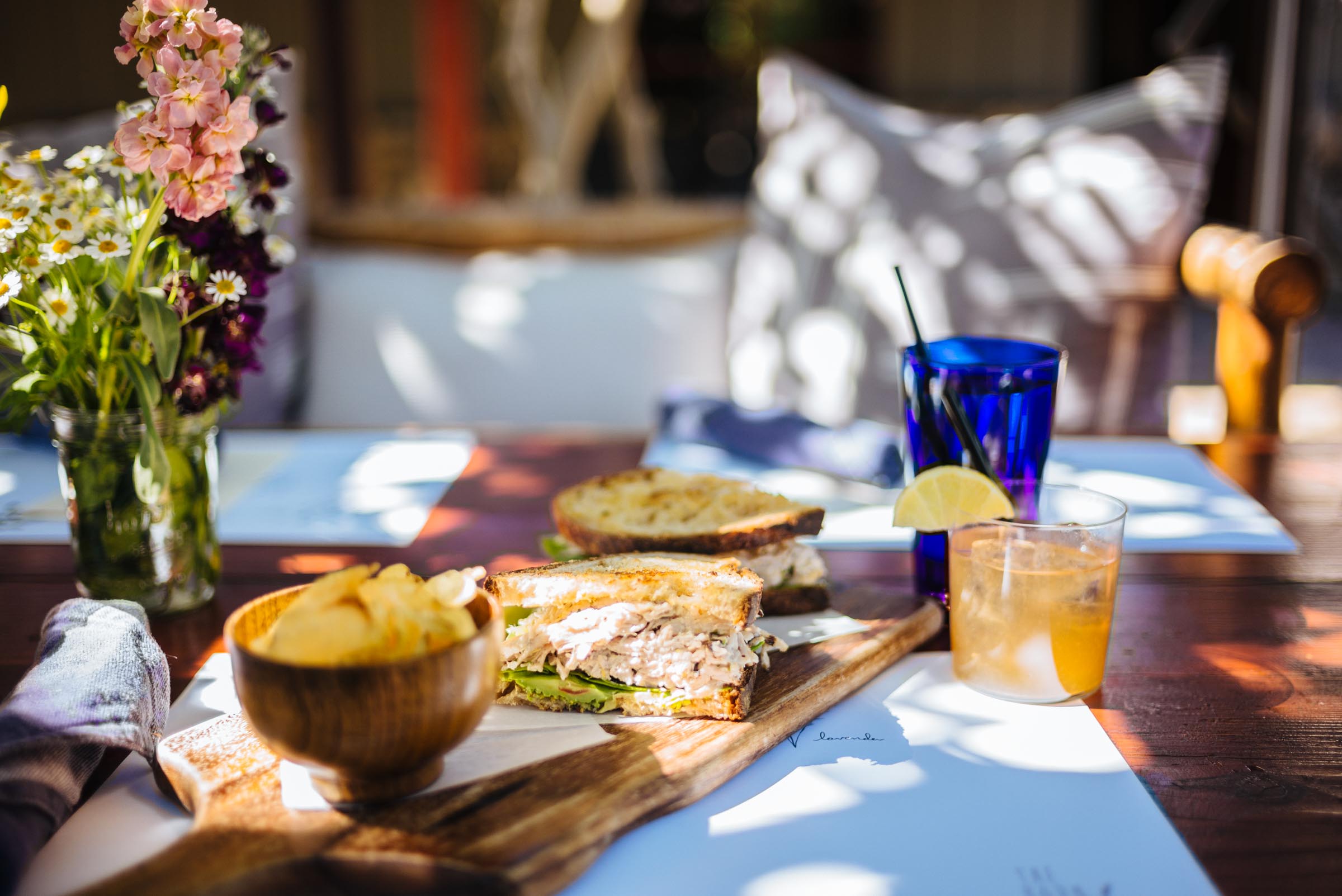 Where to eat in Palm Springs, like this local favorite for wine based cocktails and chicken salad for lunches or the steak or raost chicken dinners - plus there's a tie with Thomas Keller