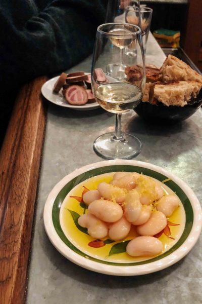 La Buvette wine bar in paris with their famous giant white beans in olive oil - photo by Kate Leahy