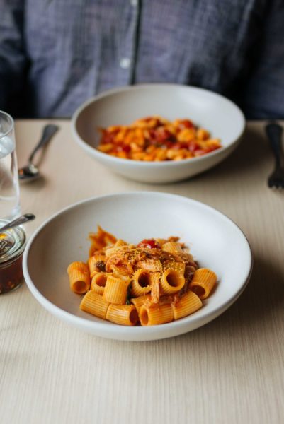 Go to Charlie Bird for the best italain lunch in new york - pick a pasta and a small plate with a glass of wine!