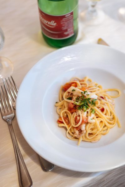 Make this Italian bucatini and Fish Pasta with Cherry Tomatoes recipe from The Taste Edit