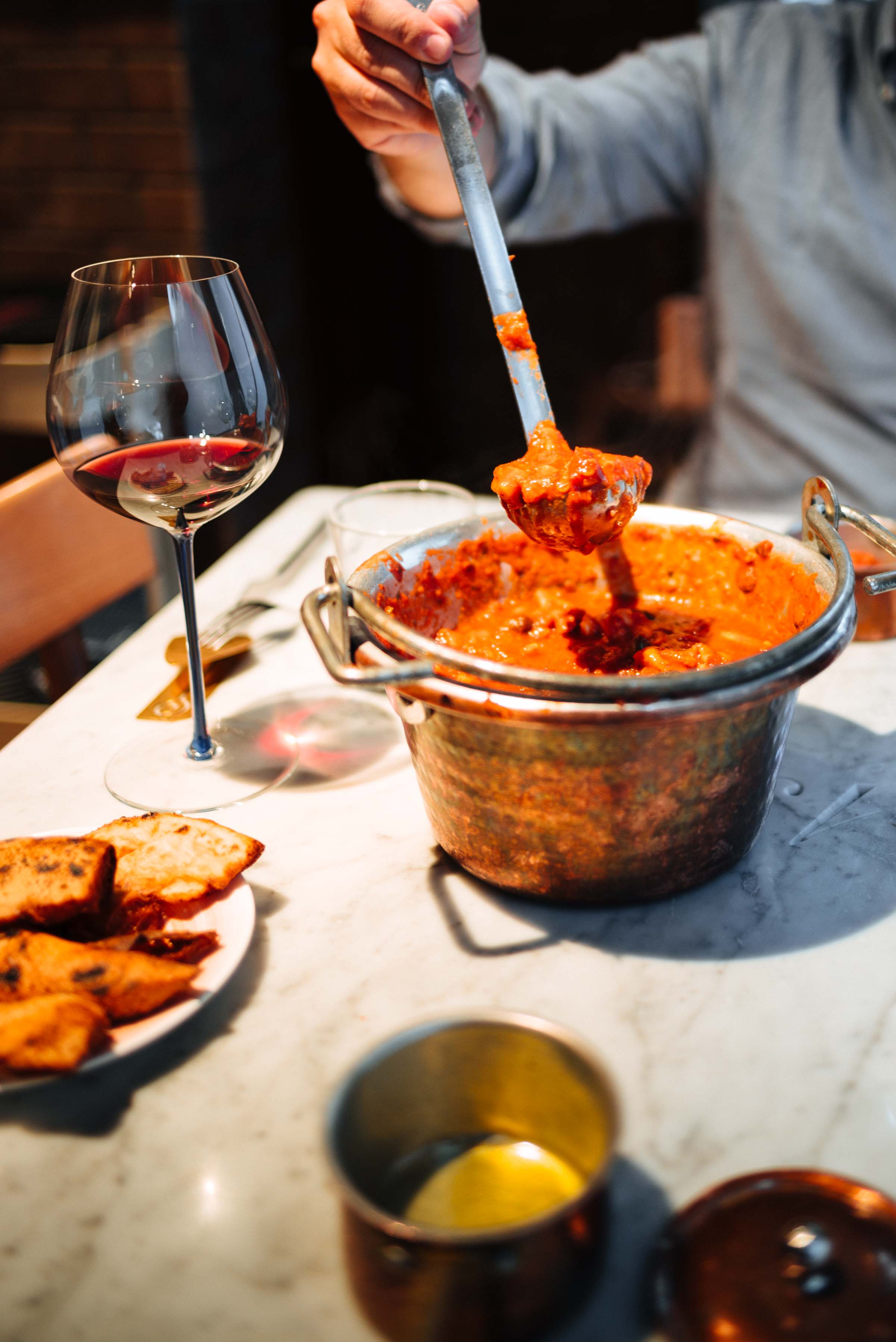 Try the Neapolitan octopus ragu made with capers, tomatoes, and octopus. This is real Italian comfort food and on of the best meals The Taste Edit has ever had! #napoli #italy #octopus #pastasauce #tomatoes