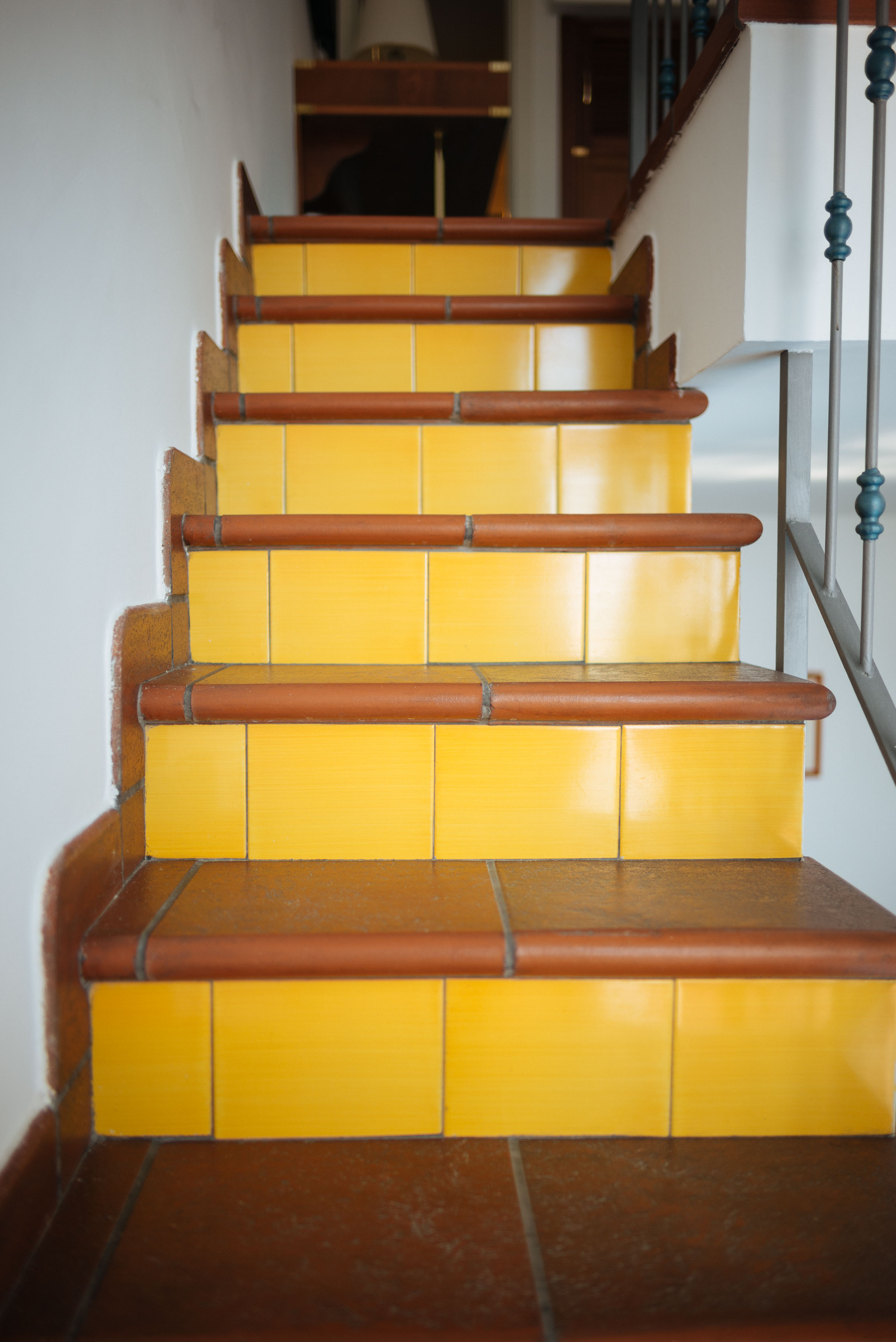 Ischia's San Montano Resort & Spa has colorful suites including yellow tiled stairs and blue showers | thetasteedit.com #italy #travel #hotel #spa