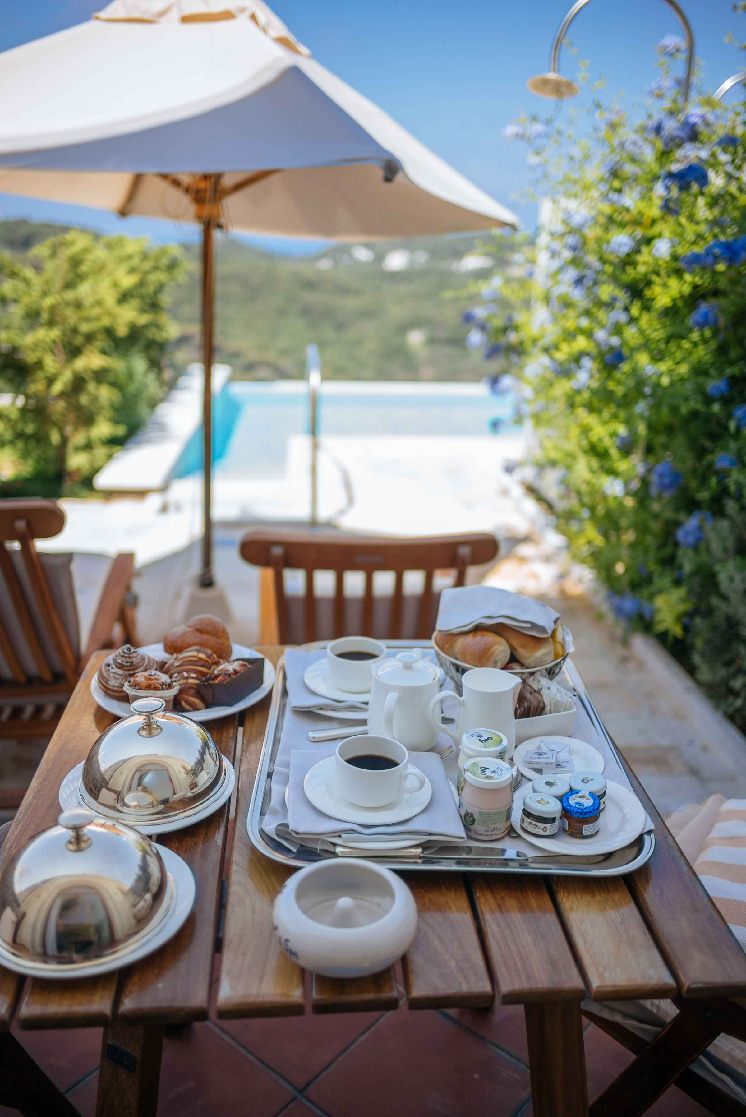 San Montano Resort & Spa breakfast including coffee and croissants served on the patio in Ischia | thetasteedit.com #italy #travel #hotel #spa