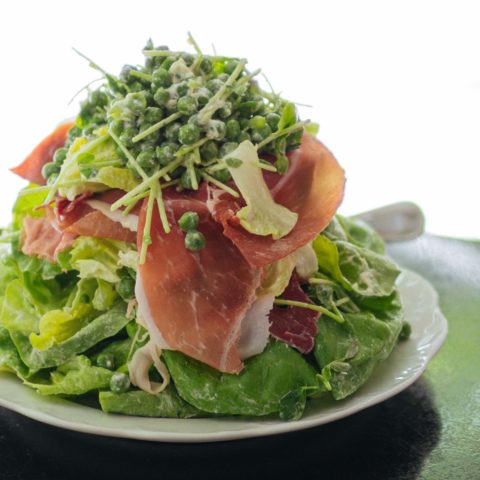 Make New York City's Via Carota's Piselli salad at home with whipped robiola cheese, peas, and prosciutto with The Taste Edit's easy salad recipe #recipe #salad #italian