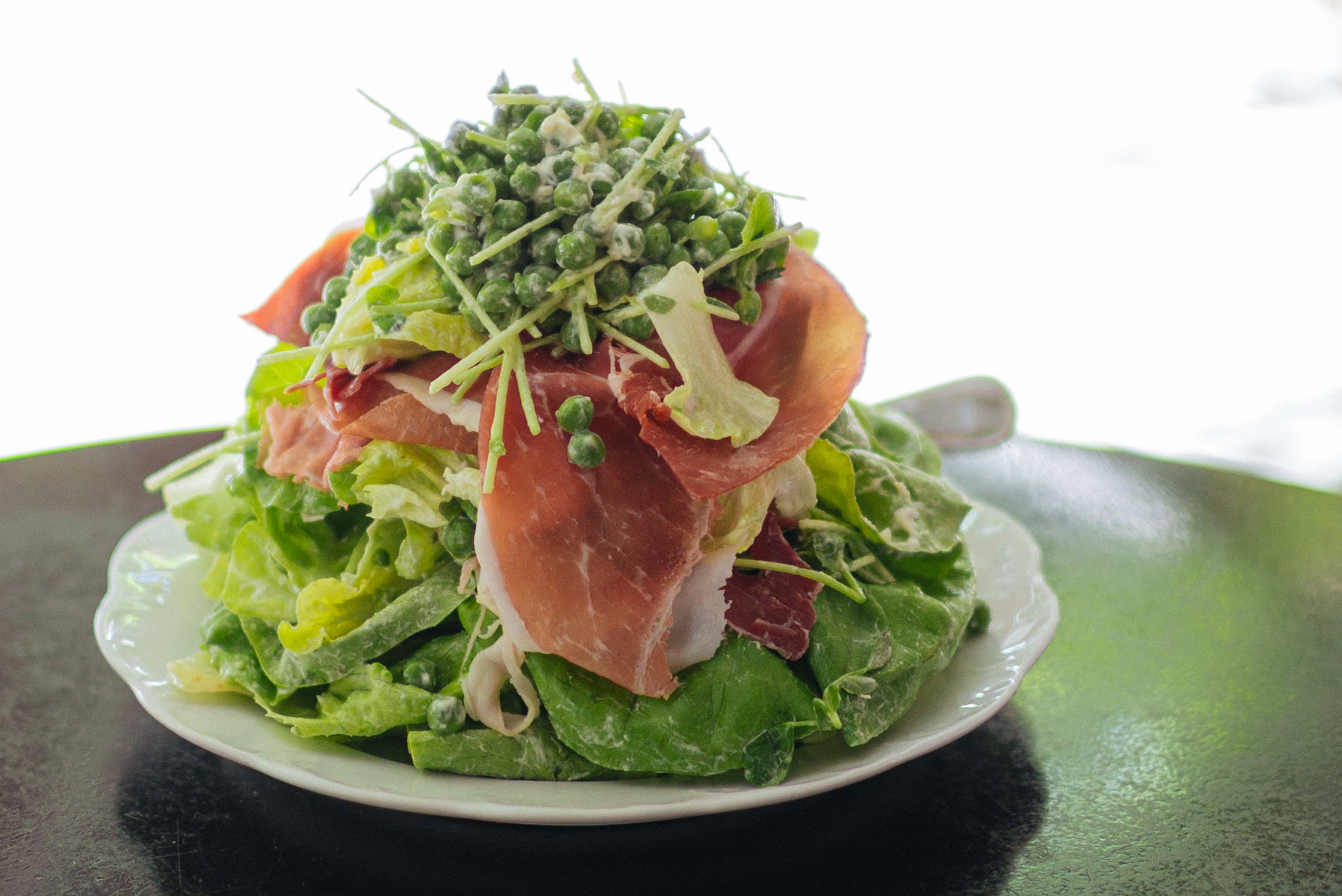 Make New York City's Via Carota's Piselli salad at home with whipped robiola cheese, peas, and prosciutto with The Taste Edit's easy pea salad recipe #recipe #salad #italian