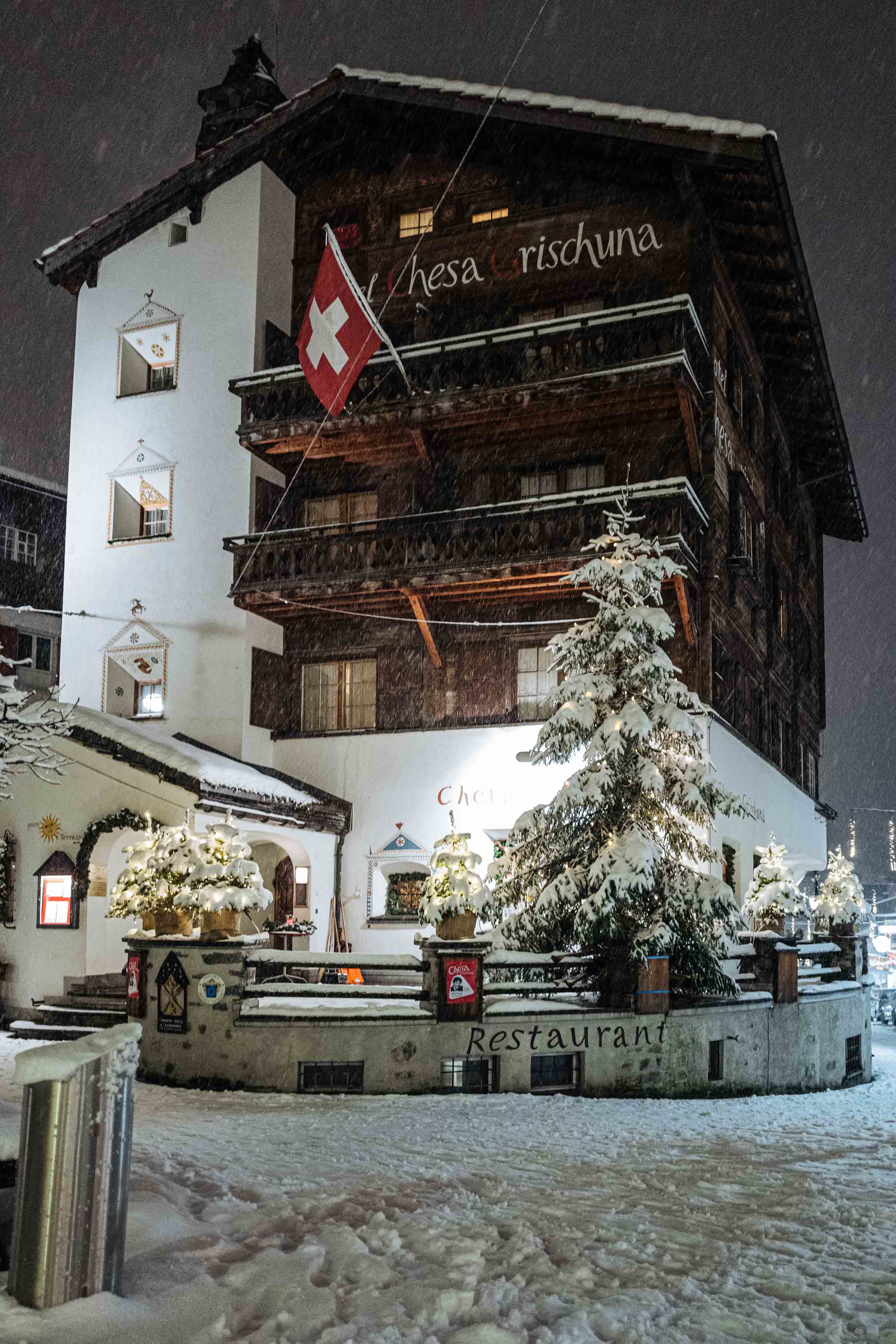 When planning your ski vacation to Klosters, stay at the Klosters Hotel chesa grischuna near Davos with historic architecture and alpine charm | The Taste Edit #travel #switzerland #swiss #snow #hotel