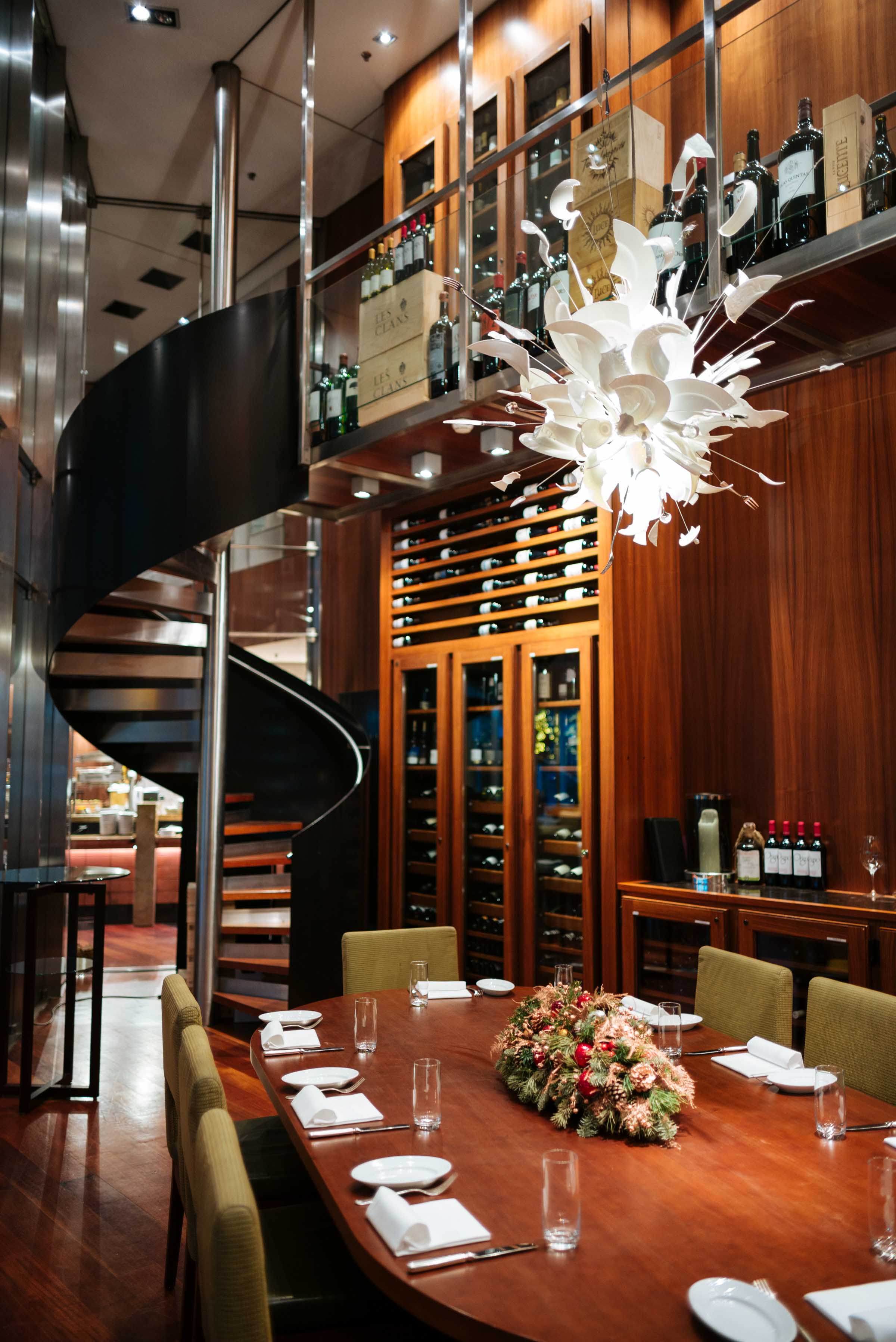 Zurich restaurant parkhuus at the Park Hyatt Zurich Hotel in Switzerland's two story wine cellar with glass doors