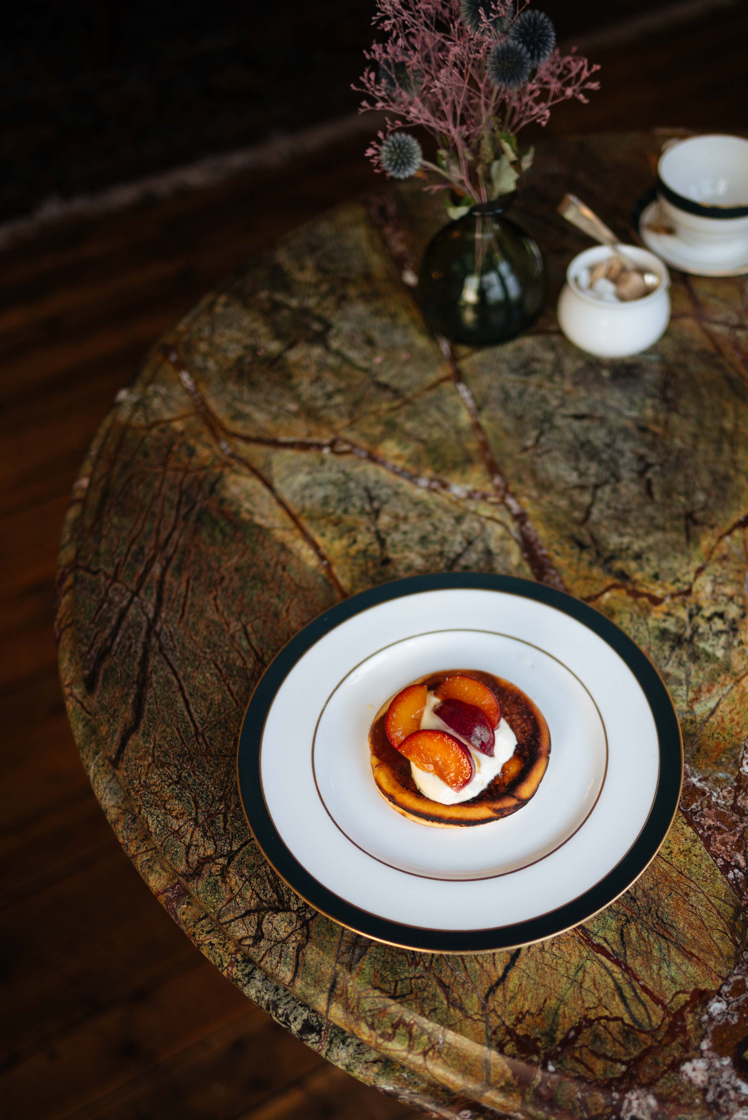 Drop scone recipe from The Fife Arms with crème fraiche and poached Scottish plums