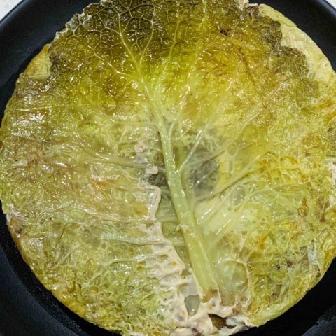 A Chou Farci is a simple French Stuffed Cabbage Recipe filled with layers of beef or pork, carrots, mirepoix, and rice or lentils. You can even make a vegetarian version. | thetasteedit.com #recipe #cabbage #French