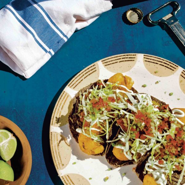 Get The Baja Cookbook Recipe - Fish tacos—batter-fried fillets, topped with cabbage, white sauce, pico de gallo, and red salsa—are possibly the most well-known street food of northern Baja. | thetasteedit.com #cookbook #recipe #taco