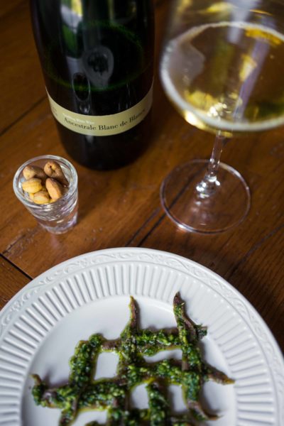 Make simple salsa verde anchovies with parsley, garlic, and olive oil to pair with your sparkling wine. | thetasteedit.com #recipe #appetizer #italian #wine