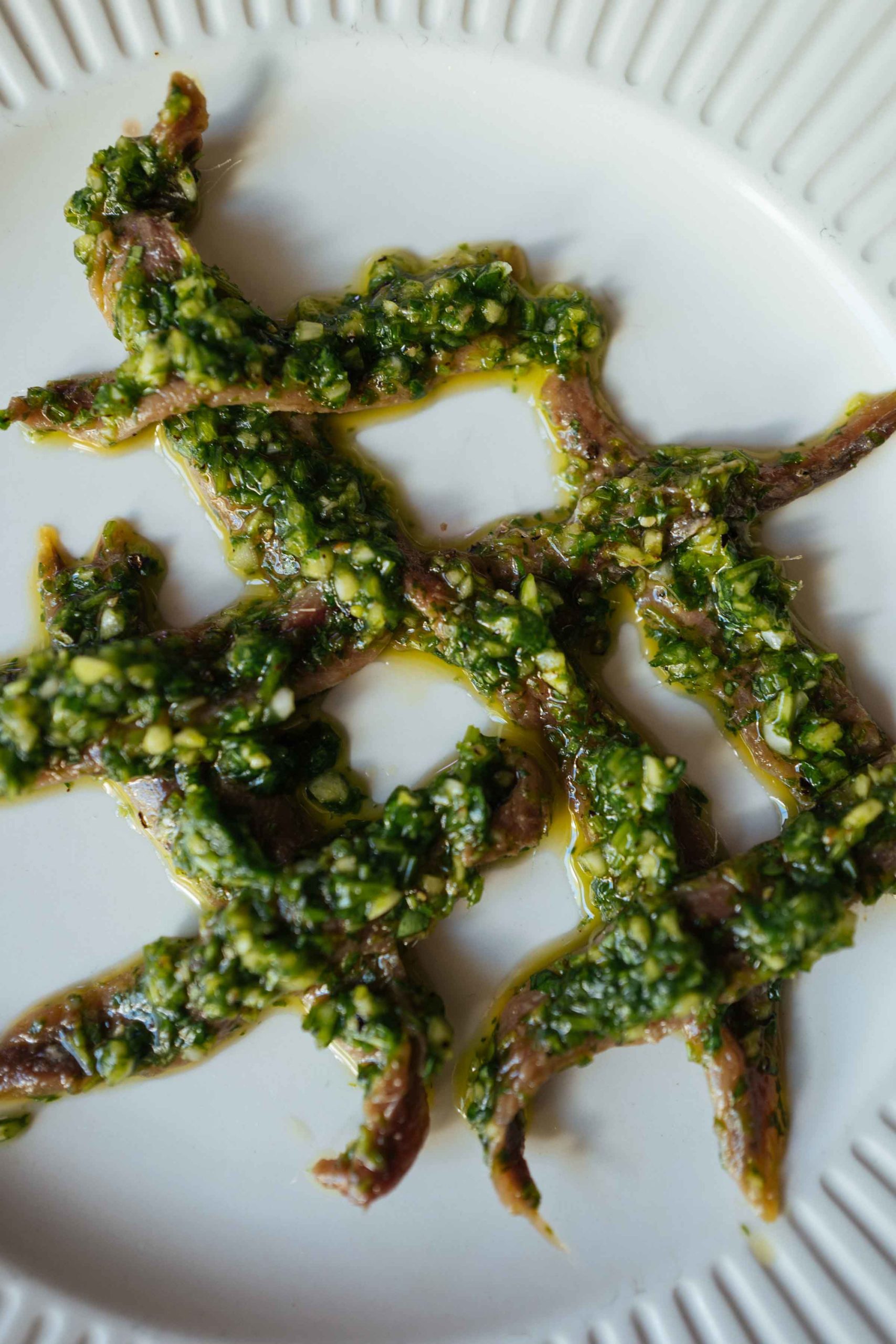 Make a plate of salsa verde anchovies inspired by the Enoteca la vite turchese n Barolo.