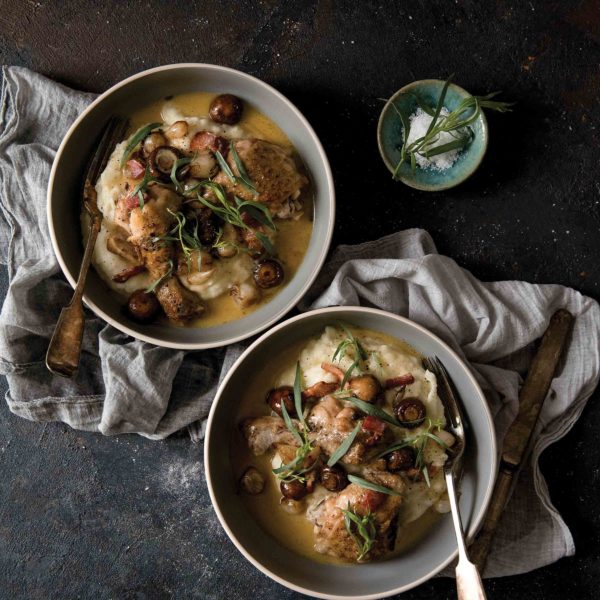 Make Burgundy French traditional recipe of CoqAuVin hearty chicken French stew from Bisous and Brioche by Laura Bradbury and Rebecca Wellman.