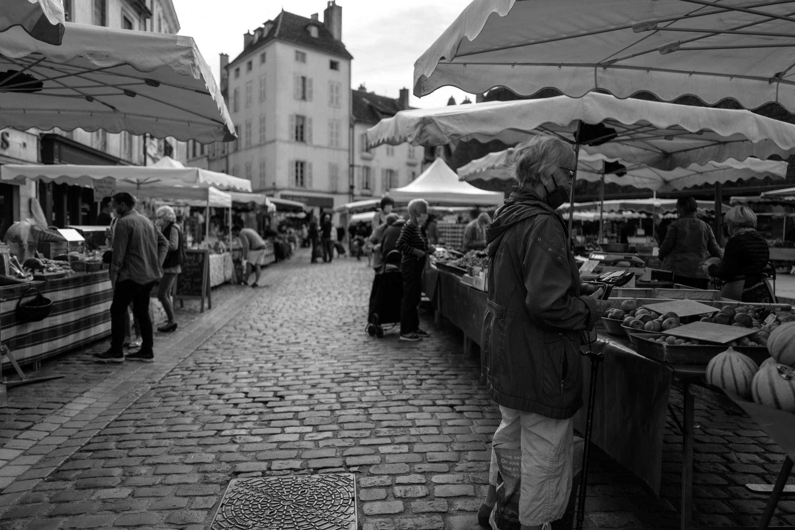What to do on your vacation to Beaune? Visit the Market in the center of Beaune on Saturday to find the best vegetables, bread, cheese, and meat. Use to cook at home if you get a rental with a kitchen. TheTasteEdit.com #france #burgundy #market #travel