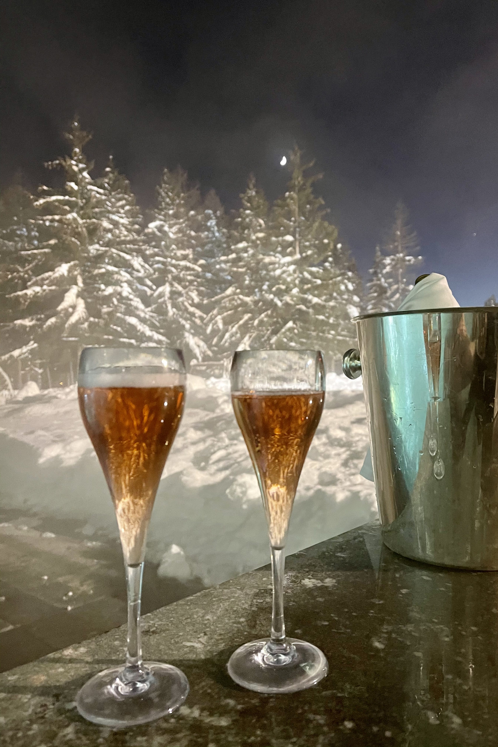 Outdoor Heated Pool with champagne at Badrutt's Palace St Moritz - The Taste Edit