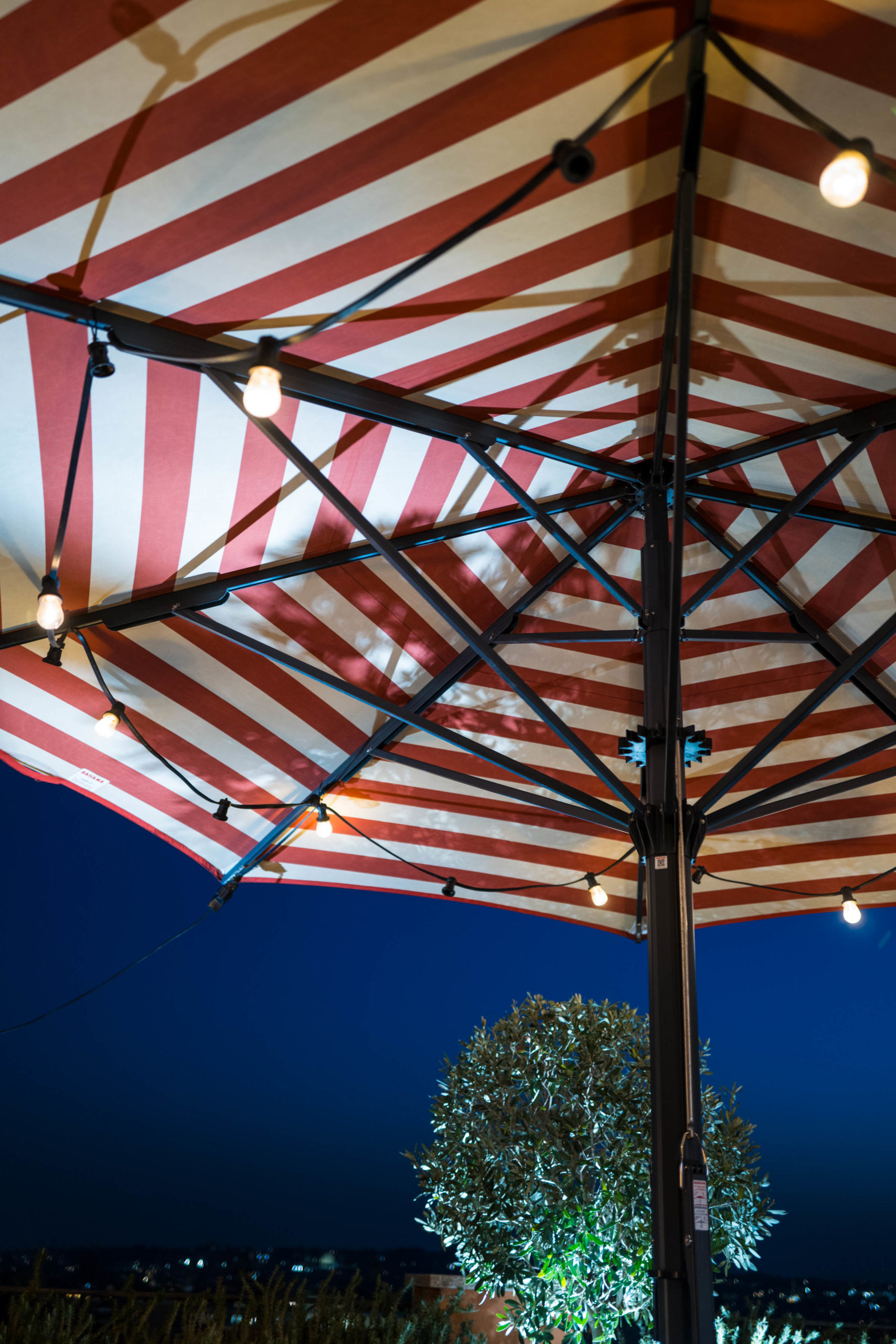 Striped umbrellas at Rocco Forte's Hotel de la Ville Rome - The Taste Edit #rome #hotel #decor #travel