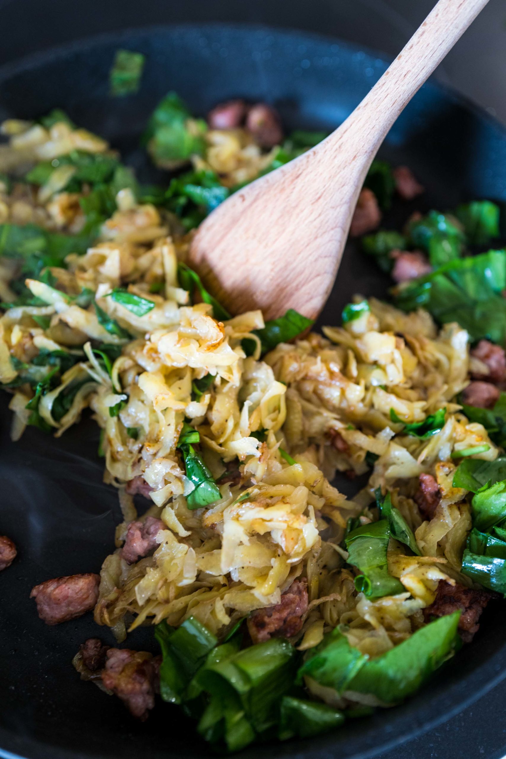 Make this easy home made hashbrowns with ramps, sausage, and eggs on top #recipe #ramps #breakfast