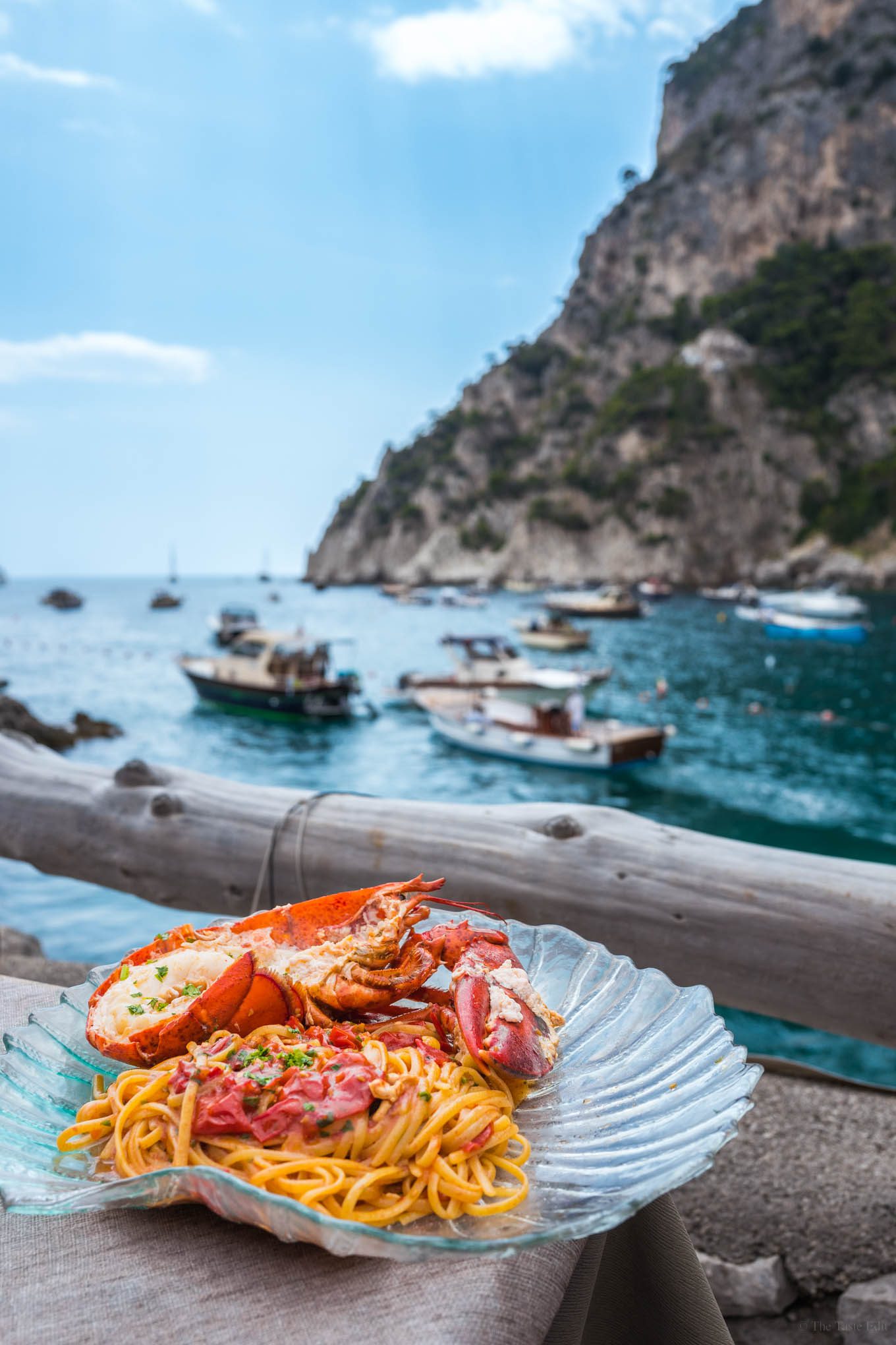 Scoglio delle sirene beach club in Capri's Italian Lobster Pasta Recipe by the rocks