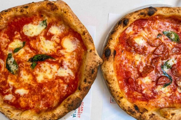 Pizza Margherita and Spicy Diavolo at Sorbillo's pizza in Milano italy