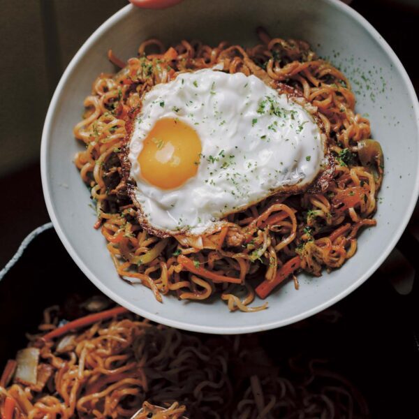 Yakisoba fried noodles made with ramen noodles and topped with a fried egg from Emiko Davis's new Japanese Gohen Cookbook